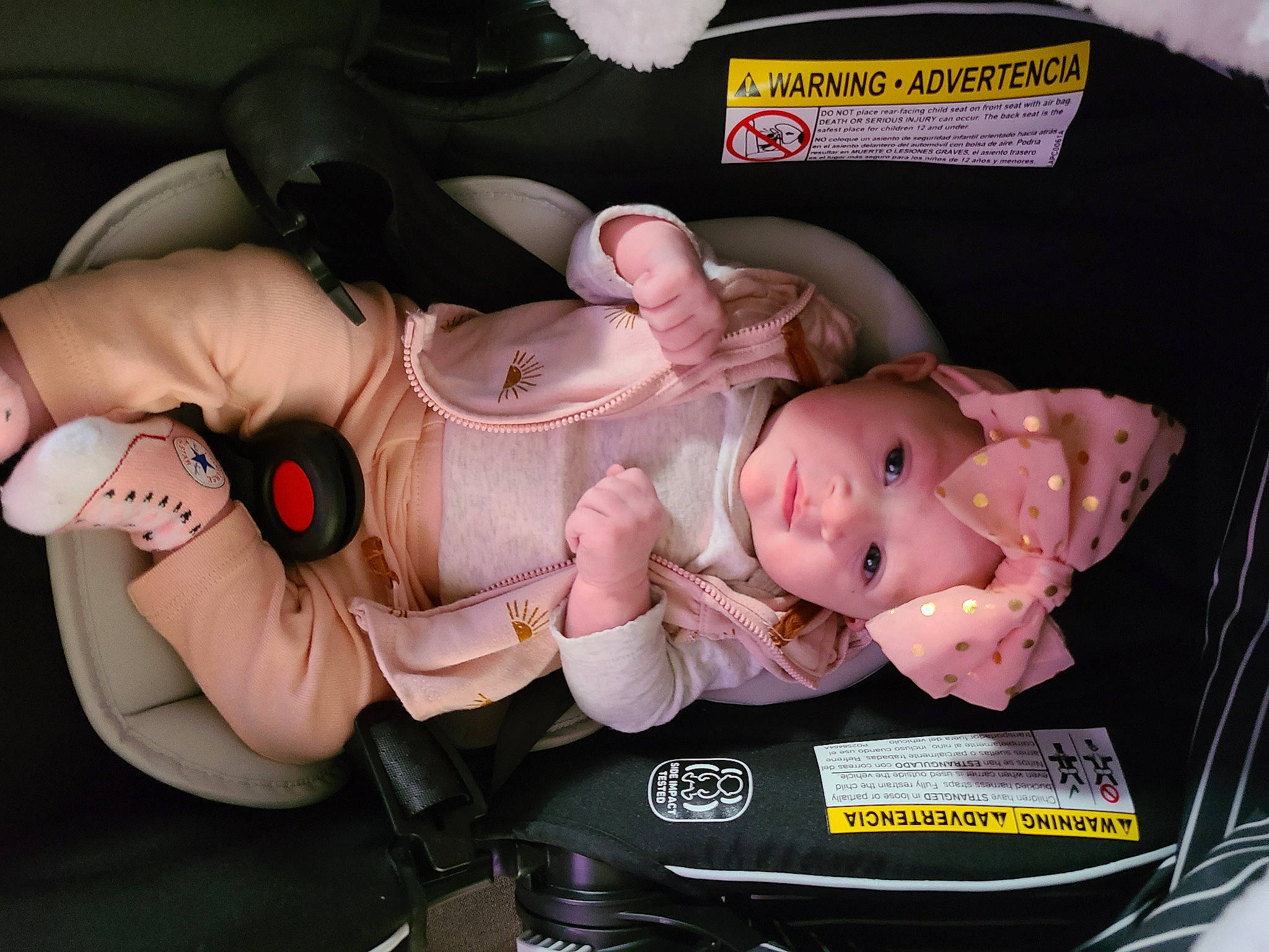 Kiya is registered to the contest to win money with this photo: baby, baby_carriage, baby_products, baby_toddler_clothing, car_seat, cheek, child, comfort, finger, gesture, hand, headwear, lap, mouth, nail, person, pink, product, service, thumb
