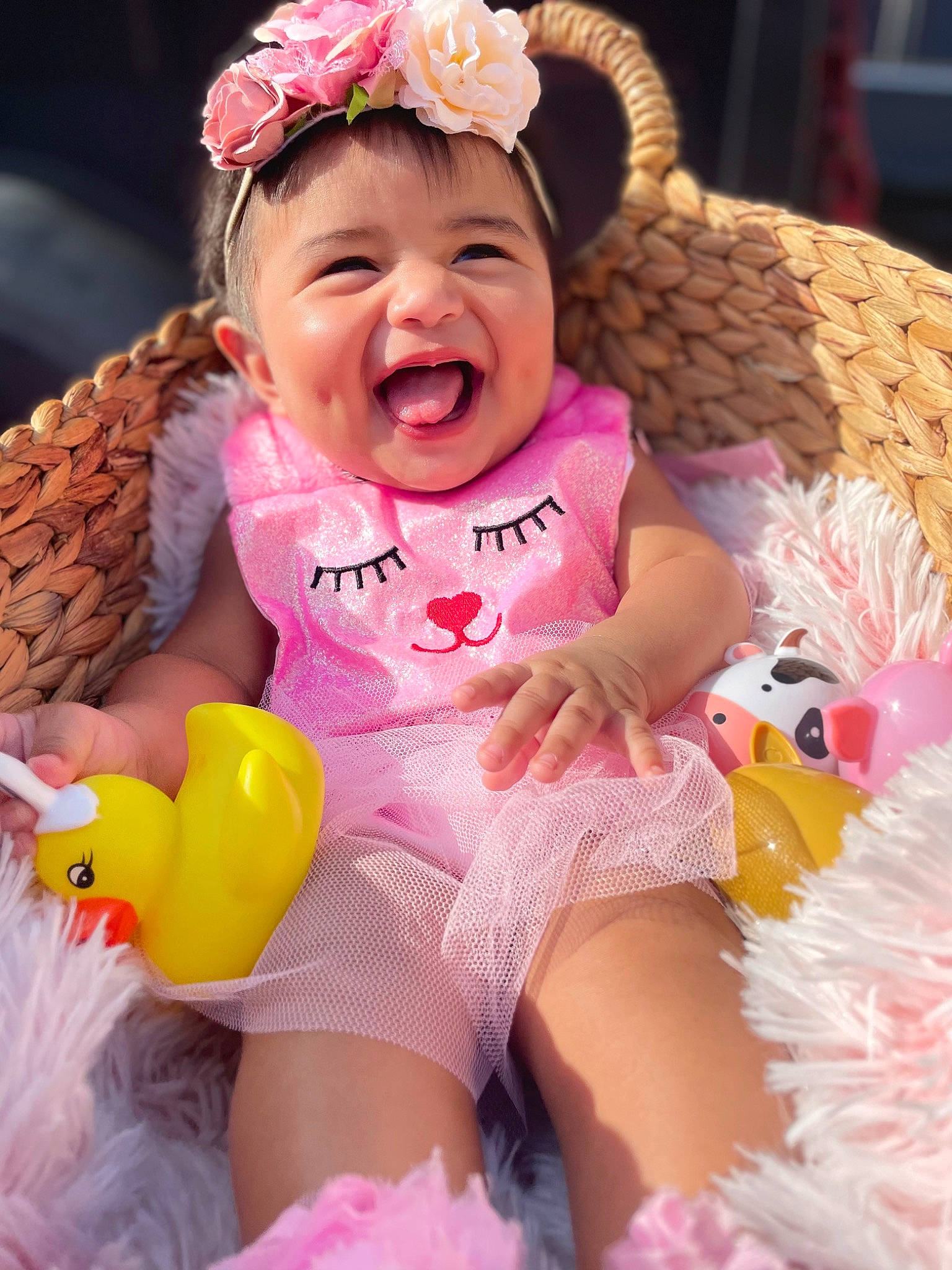 Rosie Love is registered to the contest to win money with this photo: baby, baby_toddler_clothing, beauty, cheek, child, face, facial_expression, finger, fun, grass, happy, head, headgear, human_body, person, pink, skin, smile, textile, thigh