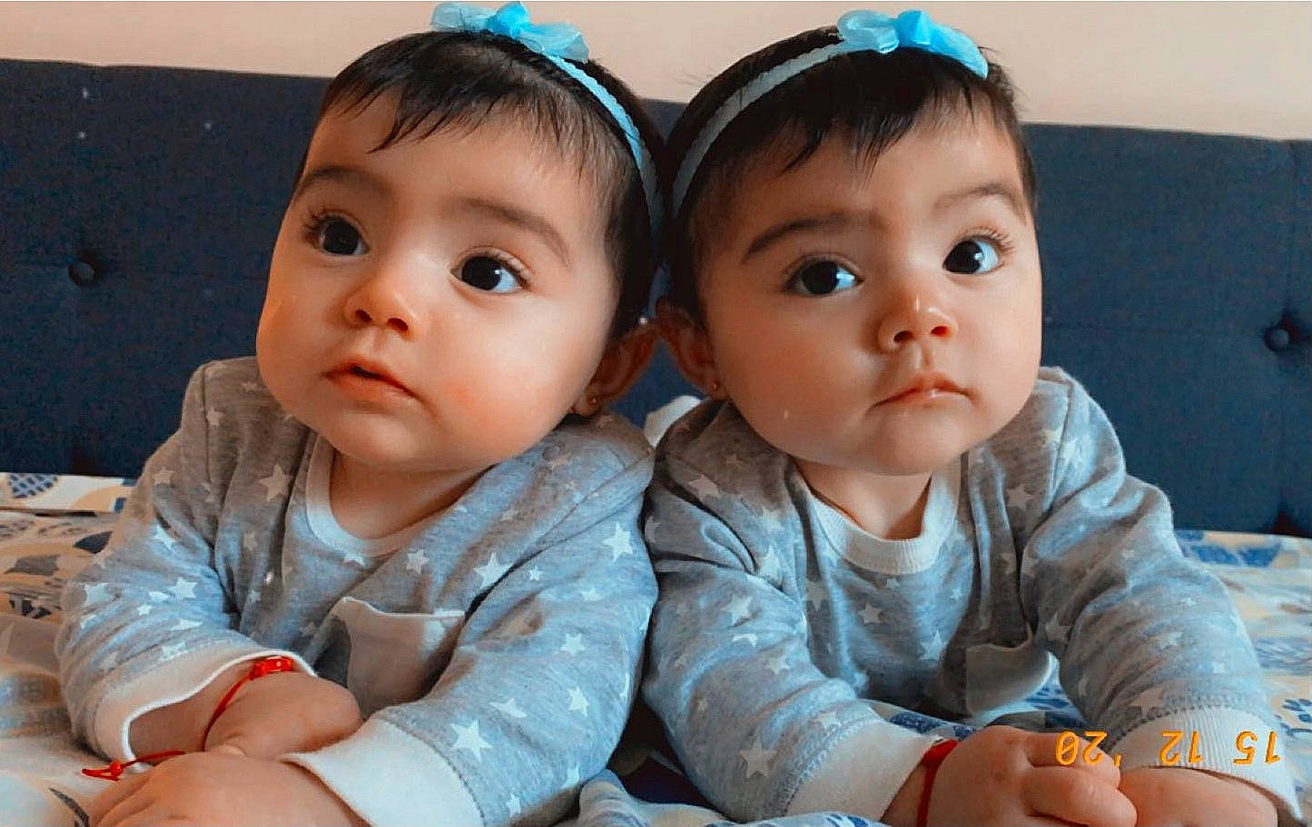 Allison Y Gabriella is registered to the contest to win money with this photo: baby, baby_toddler_clothing, cheek, child, ear, eyelash, finger, forehead, hair_accessory, hand, headband, headgear, headpiece, iris, nail, person, sitting, skin, tiara, toddler