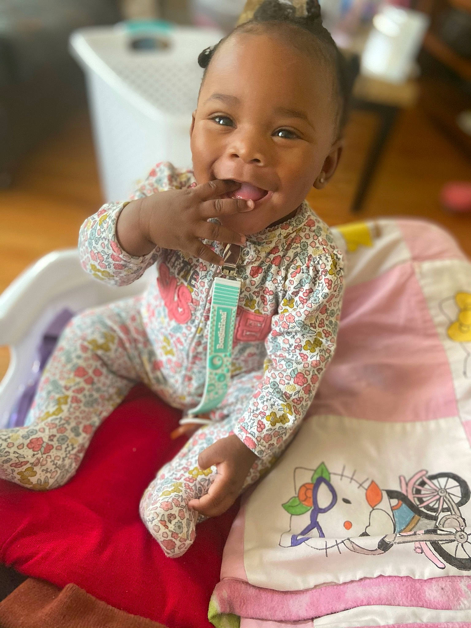 Allure is registered to the contest to win money with this photo: baby_toddler_clothing, chair, cheek, child, embellishment, event, face, facial_expression, hair, hairstyle, happy, head, iris, joy, person, sitting, skin, sleeve, smile, t_shirt