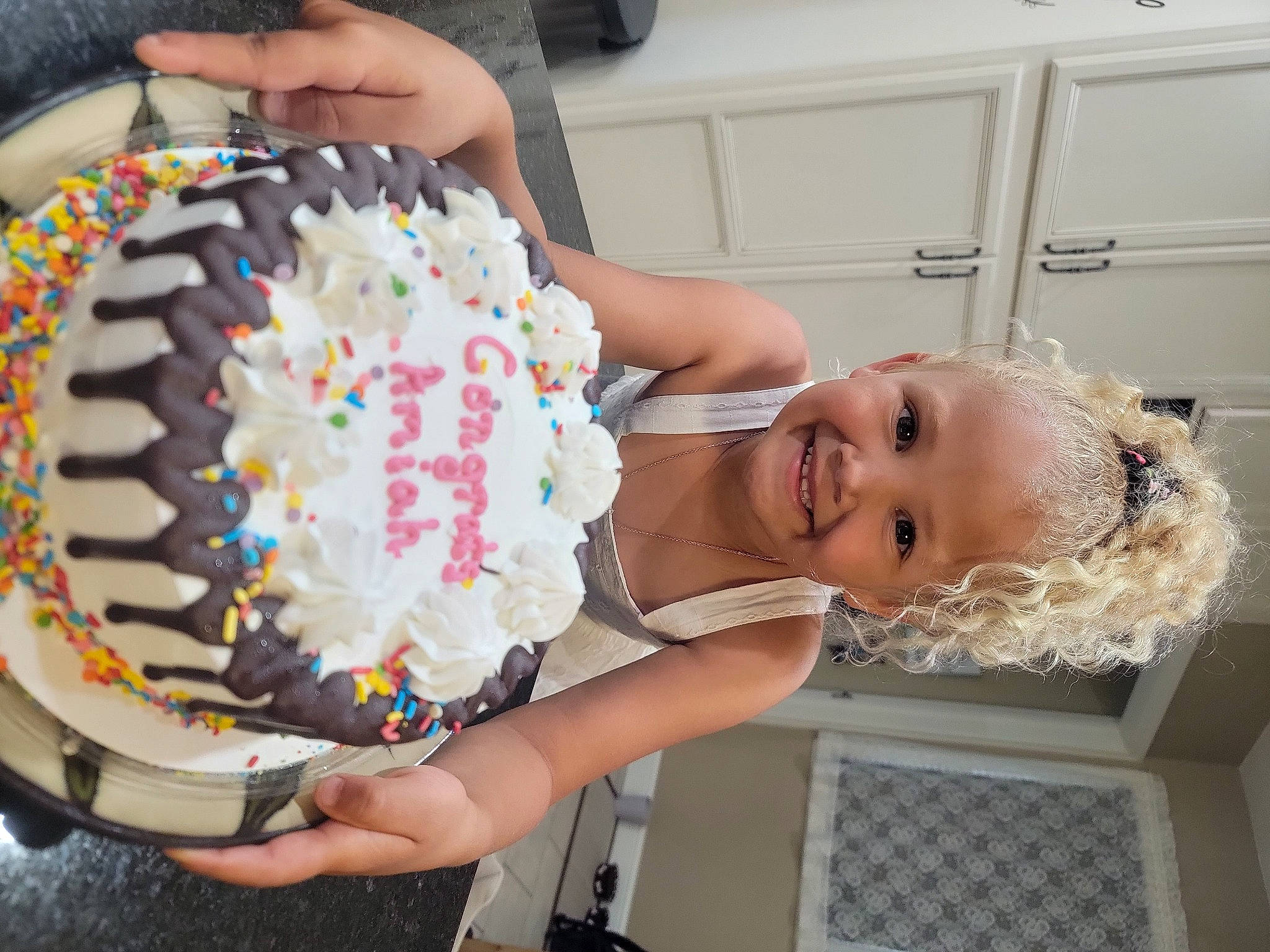 Amiah joined the competition — help win amazing prizes! baby_toddler_clothing, baking_cup, birthday_cake, buttercream, cake, cake_decorating, child, event, eyelash, food, fun, hand, happy, icing, joy, membranophone, nail, party_supply, person, smile