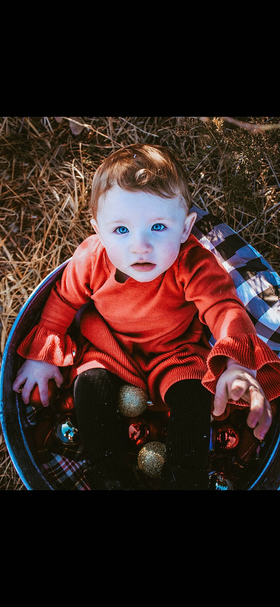 Fiona is registered to the contest to win money with this photo: automotive_lighting, baby, baby_products, baby_toddler_clothing, carmine, cheek, child, flash_photography, fun, grass, happy, iris, mouth, pattern, people, person, play, sitting, toddler, toy