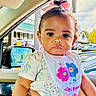 Dioř Aahmoř joined the competition — help win amazing prizes! baby, child, infant, girl, curly_hair, pink_bow, bib, floral_clothing, car_interior, car_window, side_mirror, hand, parking_lot, cars, daylight, outdoor, expressionless, portrait, person, closeup