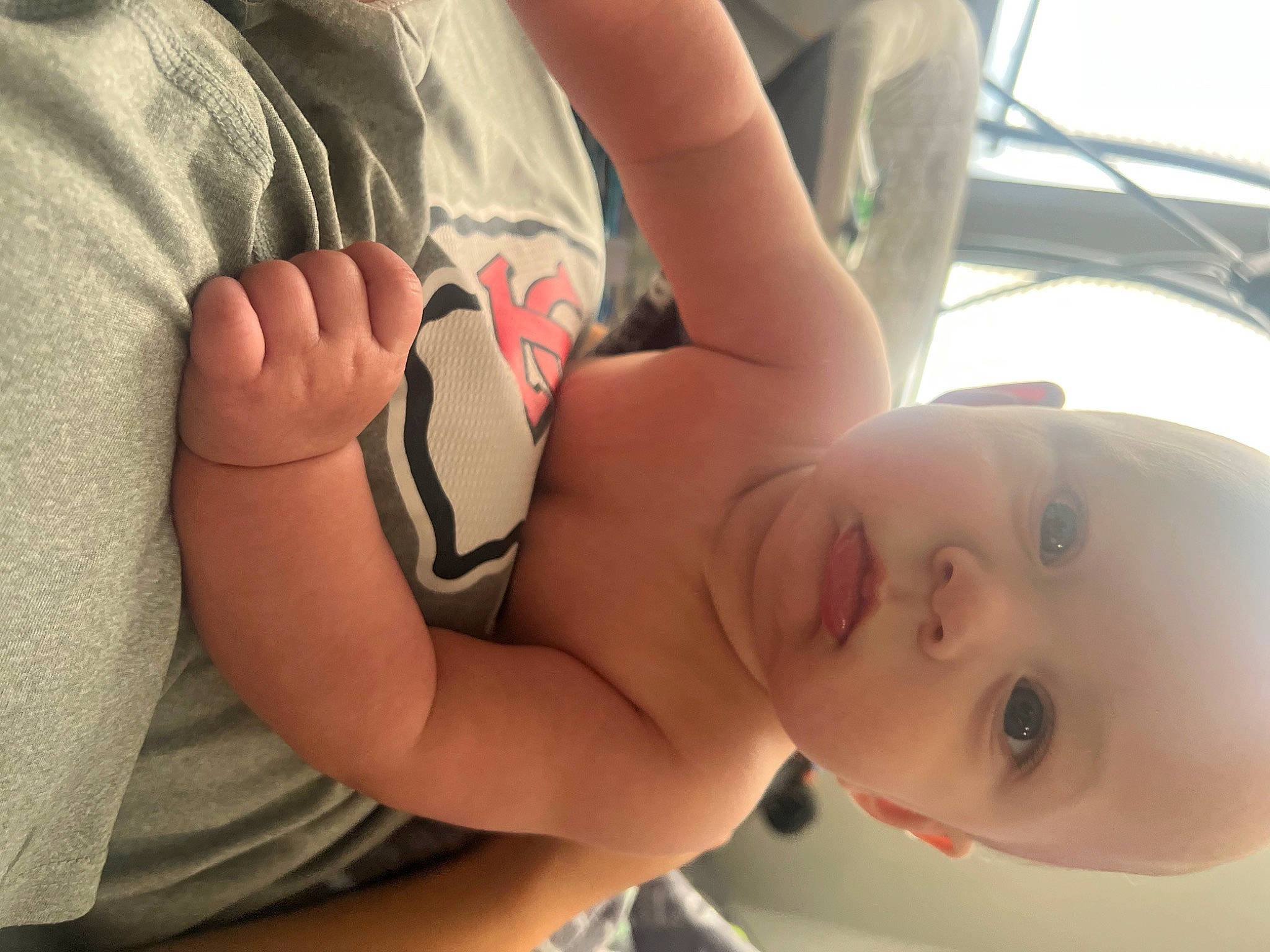 Bo is registered to the contest to win money with this photo: baby, cheek, chest, comfort, elbow, facial_expression, finger, gesture, happy, human_body, joint, leg, mouth, nose, person, product, skin, stomach, thigh, thumb