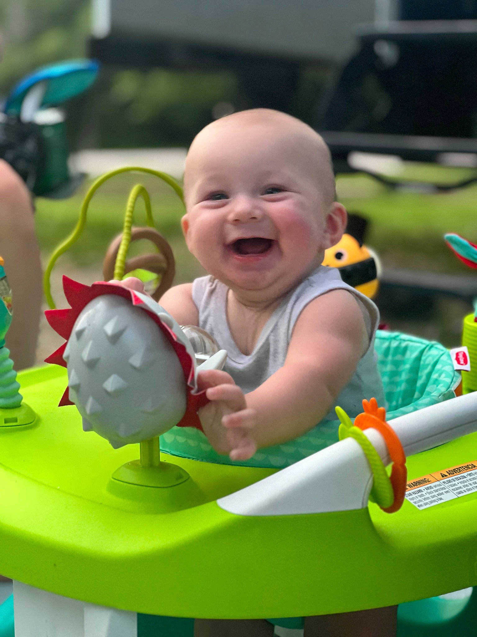 Beckham joined the competition — help win amazing prizes! baby, baby_playing_with_toys, baby_products, baby_toddler_clothing, baby_toys, child, event, facial_expression, fun, grass, green, happy, joy, leisure, person, play, recreation, sitting, smile, toddler