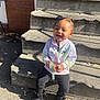 architecture, boy, building, child, clothing, coat, face, footwear, head, house, housing, jacket, male, pants, person, photography, portrait, shoe, sitting, staircase