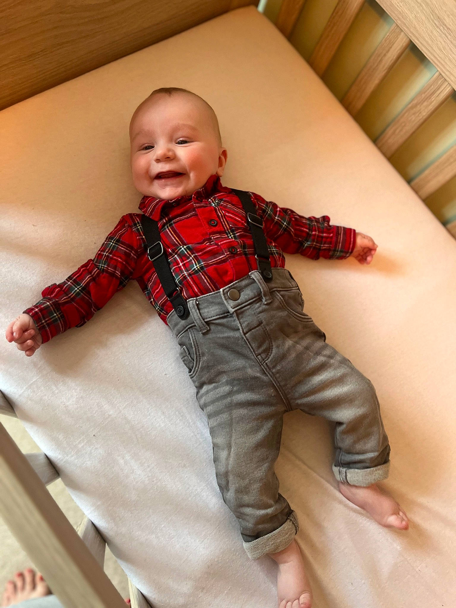 Thodore is registered to the contest to win money with this photo: arm, baby, baby_toddler_clothing, collar, comfort, dress_shirt, eye, finger, joy, leg, outerwear, person, plaid, product, skin, sleeve, smile, stairs, tartan, tie