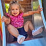 active, child, curly_hair, cute, daylight, fun, happy, metal_slide, outdoor, pink_top, play, playground, recreation, shorts, slide, smiling, summer, toddler, white_shoes, wooden_structure