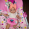 Heavenly joined the competition — help win amazing prizes! baby, infant, child, portrait, smiling, sitting, high_chair, baby_seat, minnie_mouse, pink, headband, bow, onesie, little_sister, toy, pacifier, colorful, indoors, full_body, disney