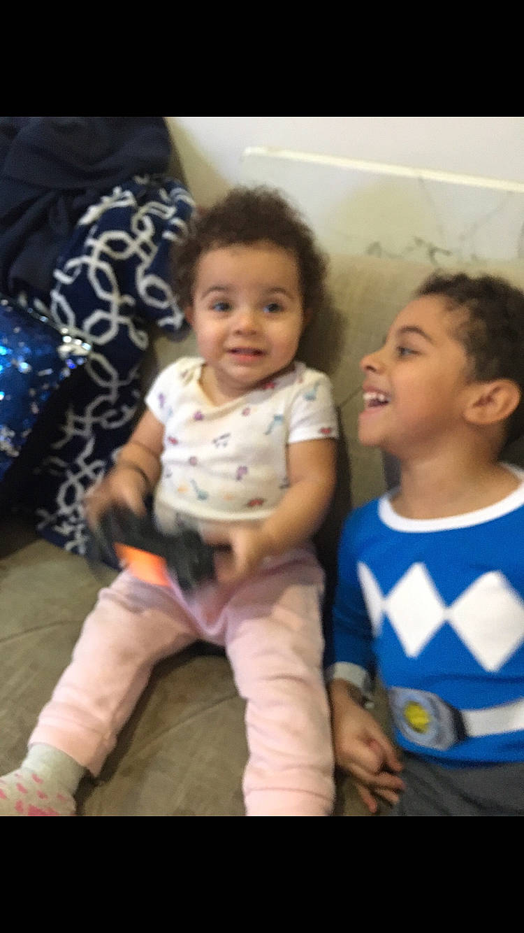 Micaela is registered to the contest to win money with this photo: baby, baby_toddler_clothing, cheek, child, chin, cool, eye, face, fun, gesture, happy, head, iris, mouth, person, skin, sleeve, smile, t_shirt, thumb