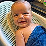 Dawson joined the competition — help win amazing prizes! baby, smiling, blue_towel, bath, baby_bath_seat, happy, infant, water, skin, face, arm, kitchen_counter, cup, cleaning_brush, sink, indoors, closeup, child, person, toddler