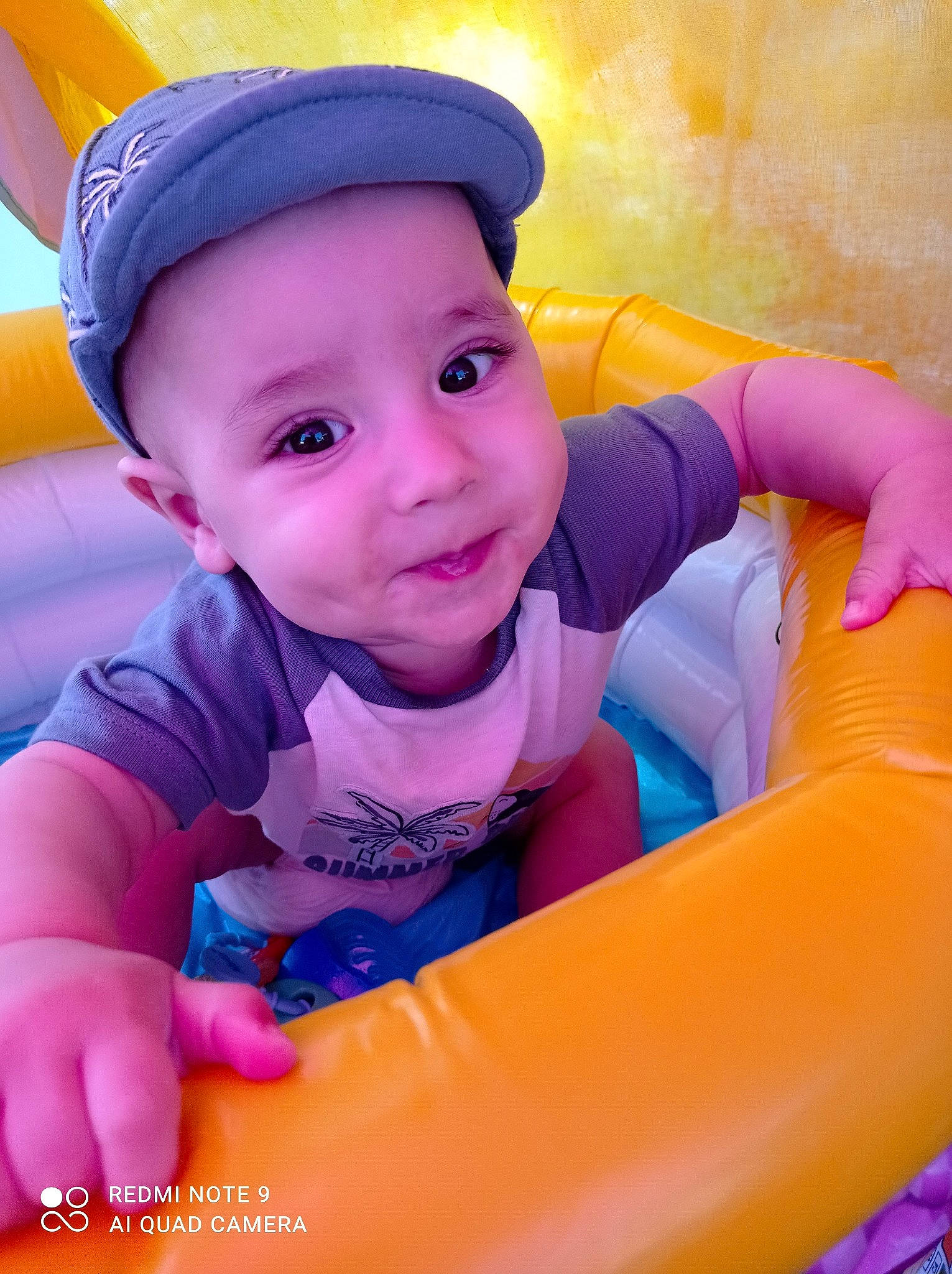 Angel participe au concours pour gagner de l'argent avec cette photo : baby, baby_toddler_clothing, blue, cap, child, electric_blue, fun, happy, hat, headwear, leisure, magenta, person, pink, playground, purple, recreation, sitting, smile, t_shirt