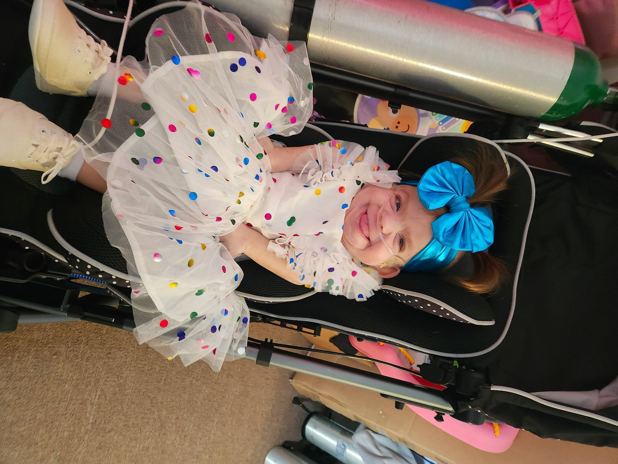 Nora is registered to the contest to win money with this photo: baby, baby_products, baby_safety, baby_toddler_clothing, child, fun, headwear, joy, pattern, person, toddler, vehicle_door