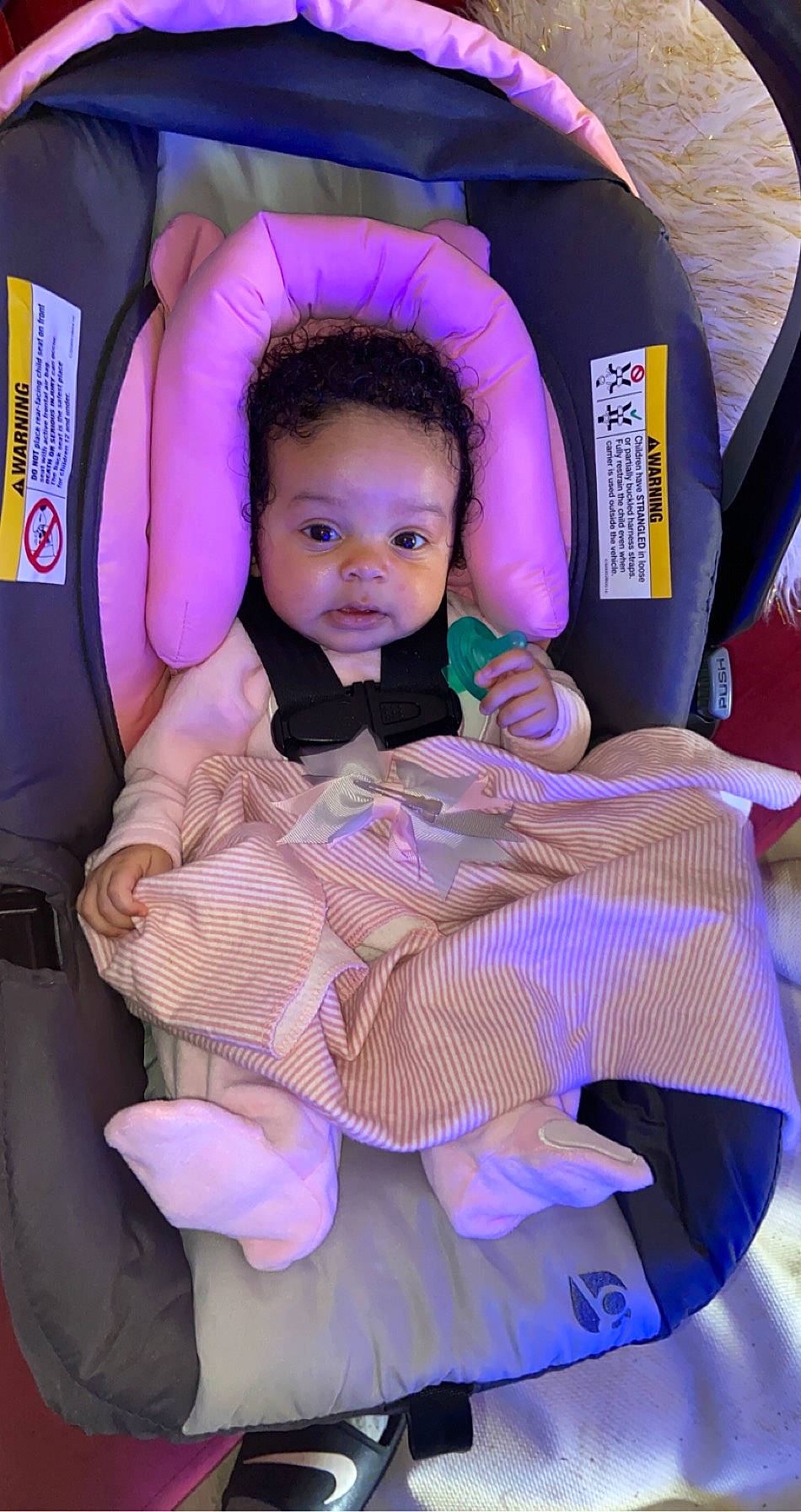 Kailee is registered to the contest to win money with this photo: baby, baby_carriage, baby_products, baby_toddler_clothing, car_seat, child, comfort, event, fashion, formal_wear, fun, happy, leisure, magenta, person, pink, purple, sitting, textile, toddler