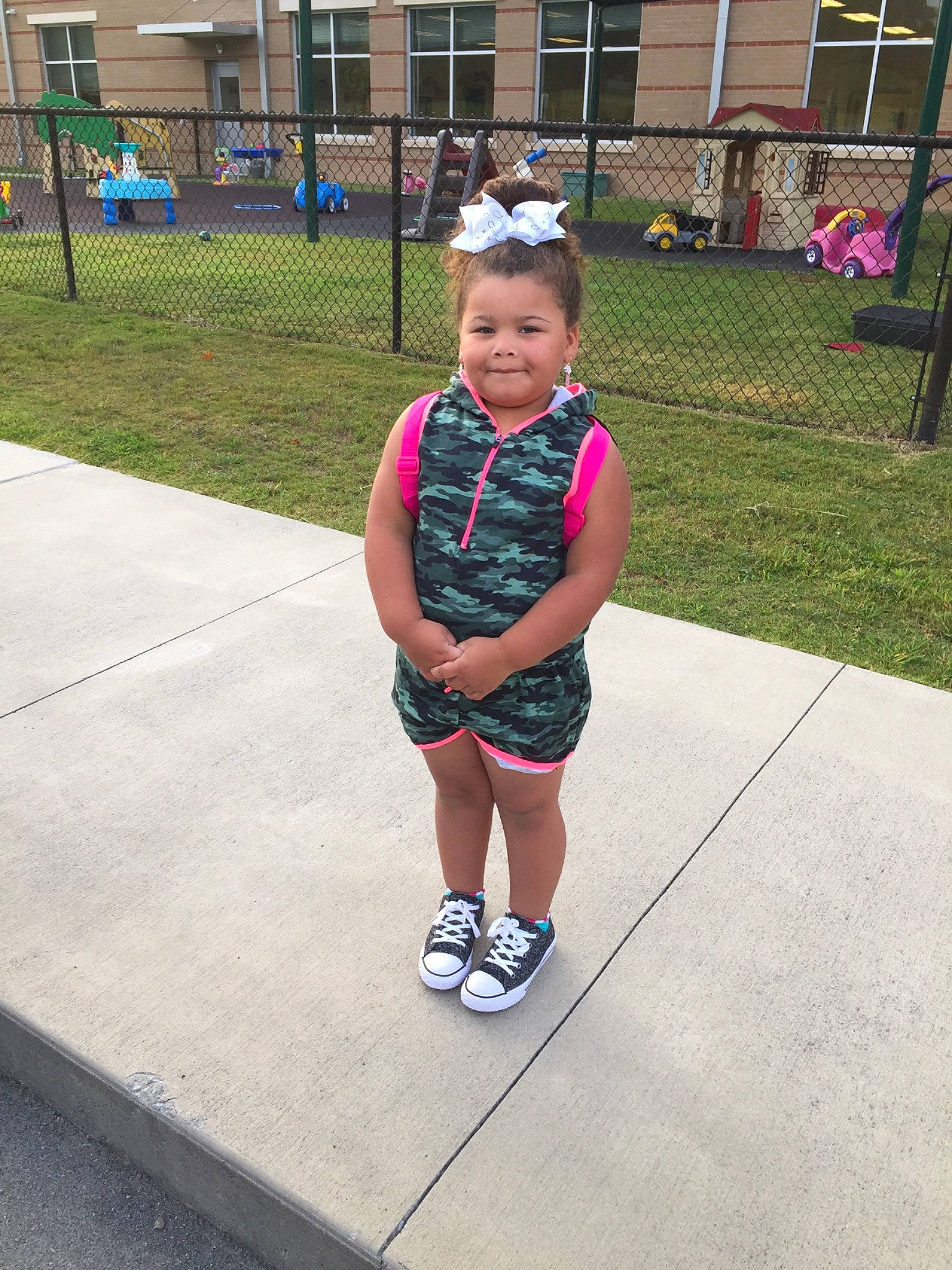 Cassidy is registered to the contest to win money with this photo: child, footwear, fun, joy, leisure, person, plant, recreation, shoe, smile, style, summer, toddler, vacation