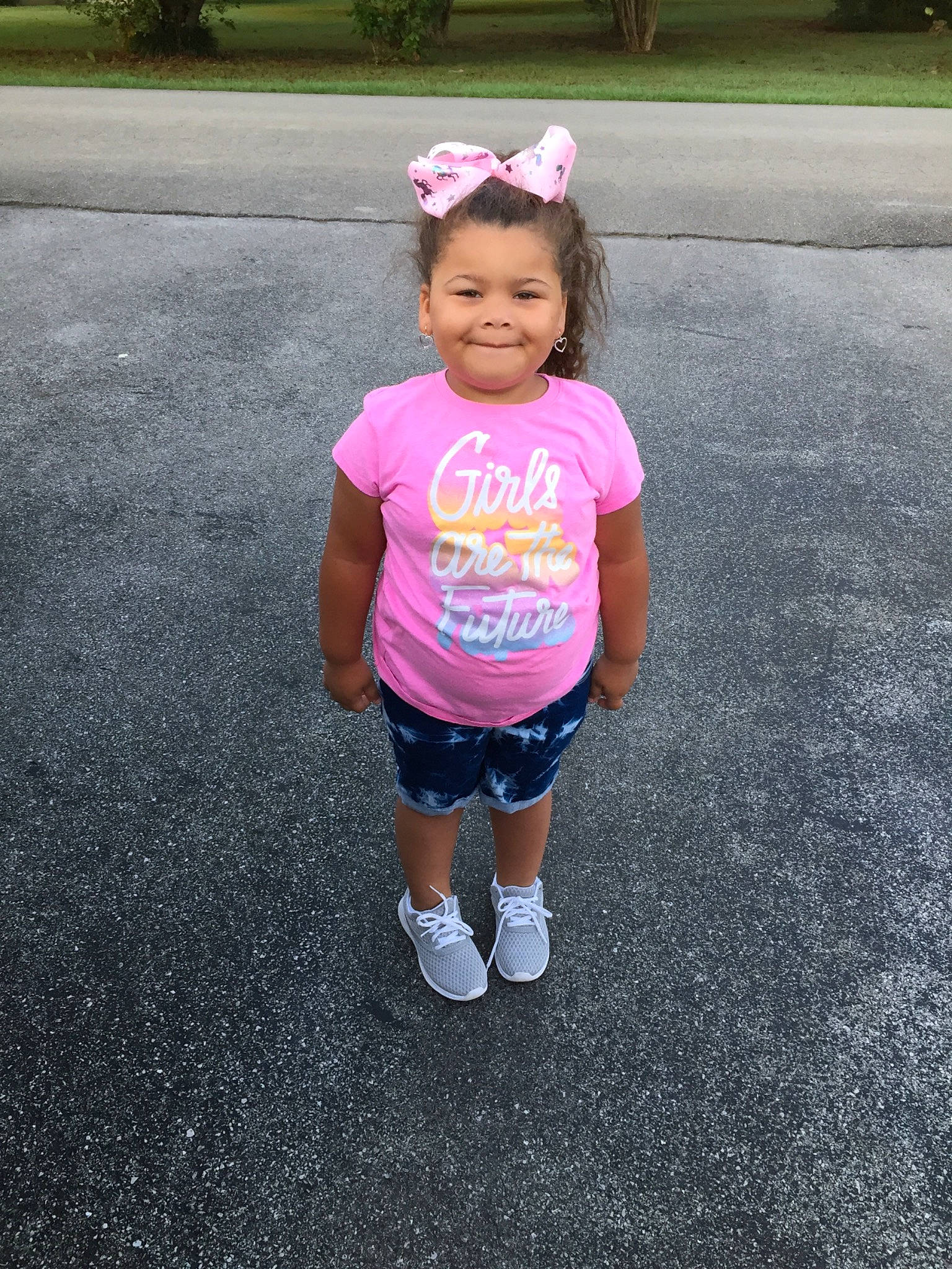 Cassidy joined the competition — help win amazing prizes! asphalt, child, flower, happy, head, joy, person, pink, plant, play, road_surface, smile, summer, t_shirt, toddler, vacation, walking
