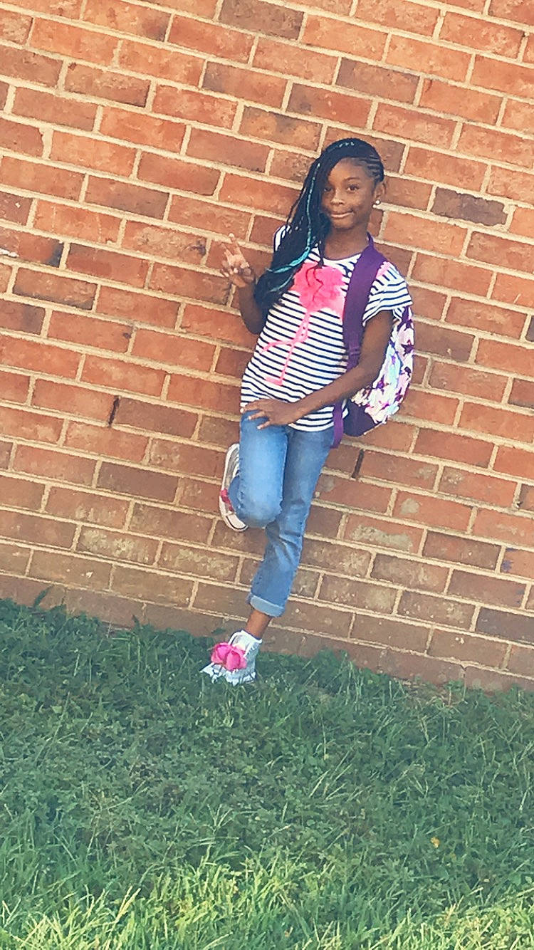 Kimari is registered to the contest to win money with this photo: brick, cool, denim, fashion, footwear, grass, jeans, pattern, person, photography, pink, plaid, plant, shoe, t_shirt, textile, trousers