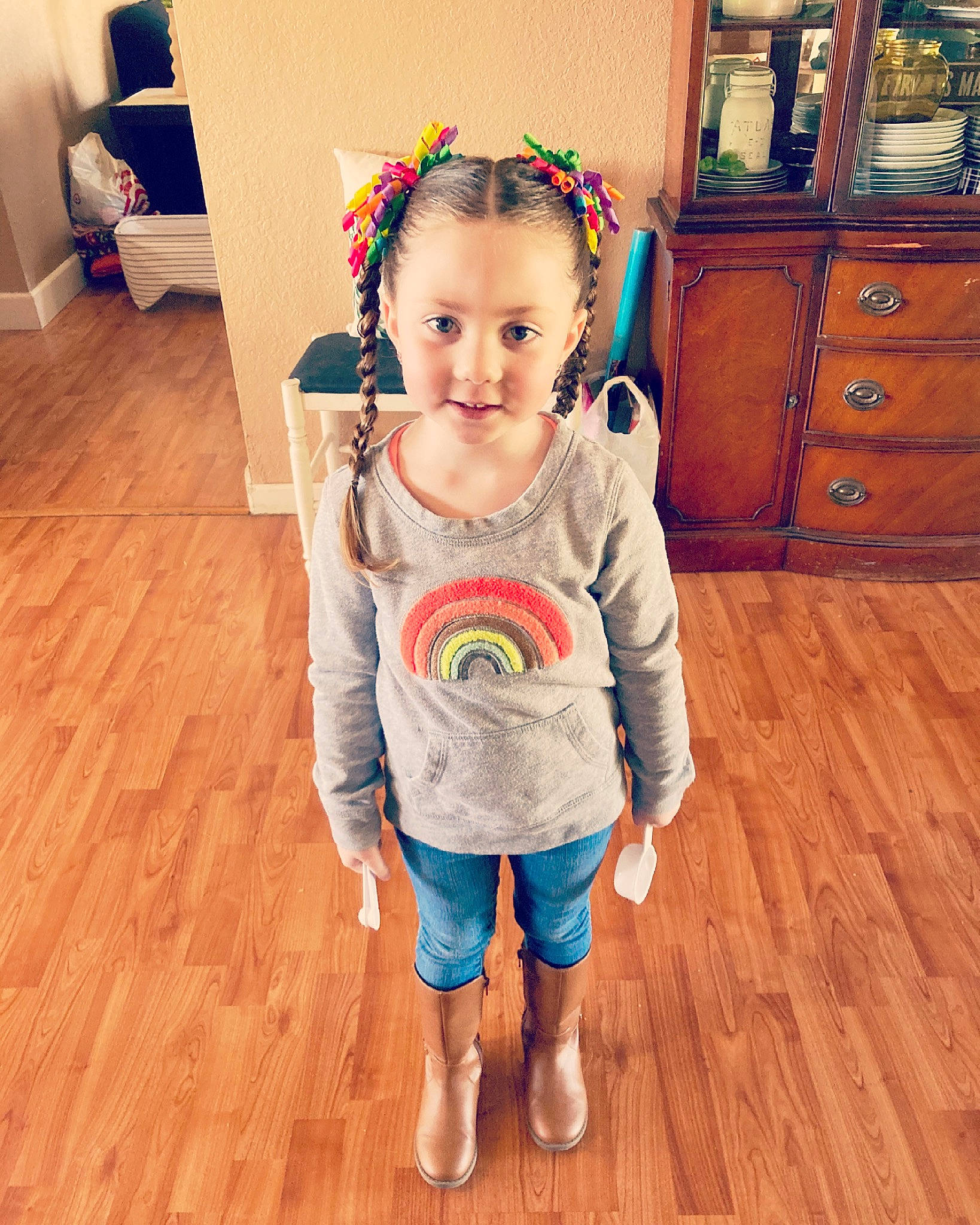 Paislee is registered to the contest to win money with this photo: arm, baby, baby_toddler_clothing, cabinetry, cool, face, floor, flooring, hair, happy, hardwood, jeans, laminate_flooring, person, skin, sleeve, t_shirt, toddler, waist, wood