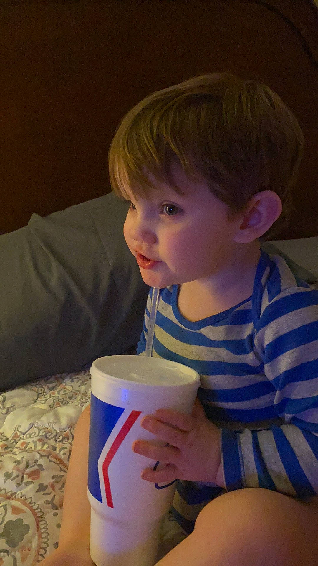 Kain is registered to the contest to win money with this photo: baby_toddler_clothing, beauty, cheek, child, cup, drink, drinking, drinkware, electric_blue, face, finger, fun, head, organ, person, room, sitting, t_shirt, table, toddler