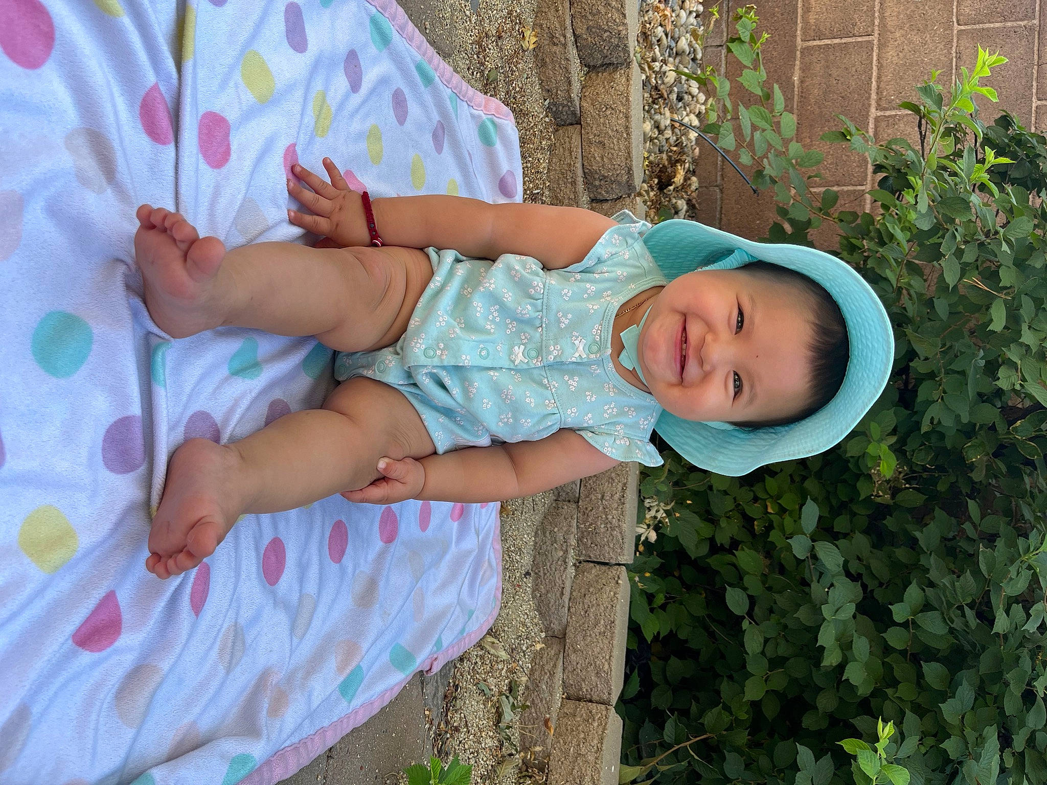 Emery joined the competition — help win amazing prizes! baby, baby_toddler_clothing, clothing, dress, facial_expression, grass, happy, hat, joy, leaf, people_in_nature, person, pink, plant, skin, sleeve, smile, sun_hat, t_shirt, textile