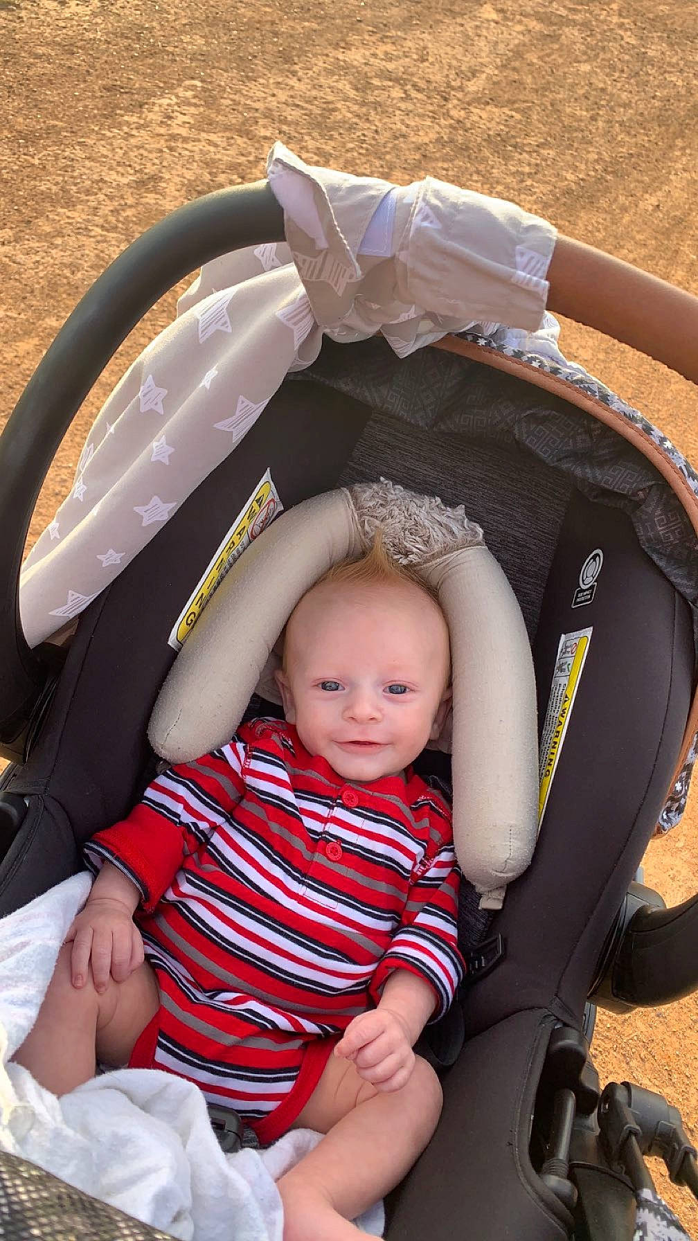 Jack joined the competition — help win amazing prizes! baby, baby_carriage, baby_products, baby_toddler_clothing, car_seat, chair, child, comfort, finger, fun, happy, lap, person, personal_protective_equipment, play, sitting, skin, smile, thumb, toddler