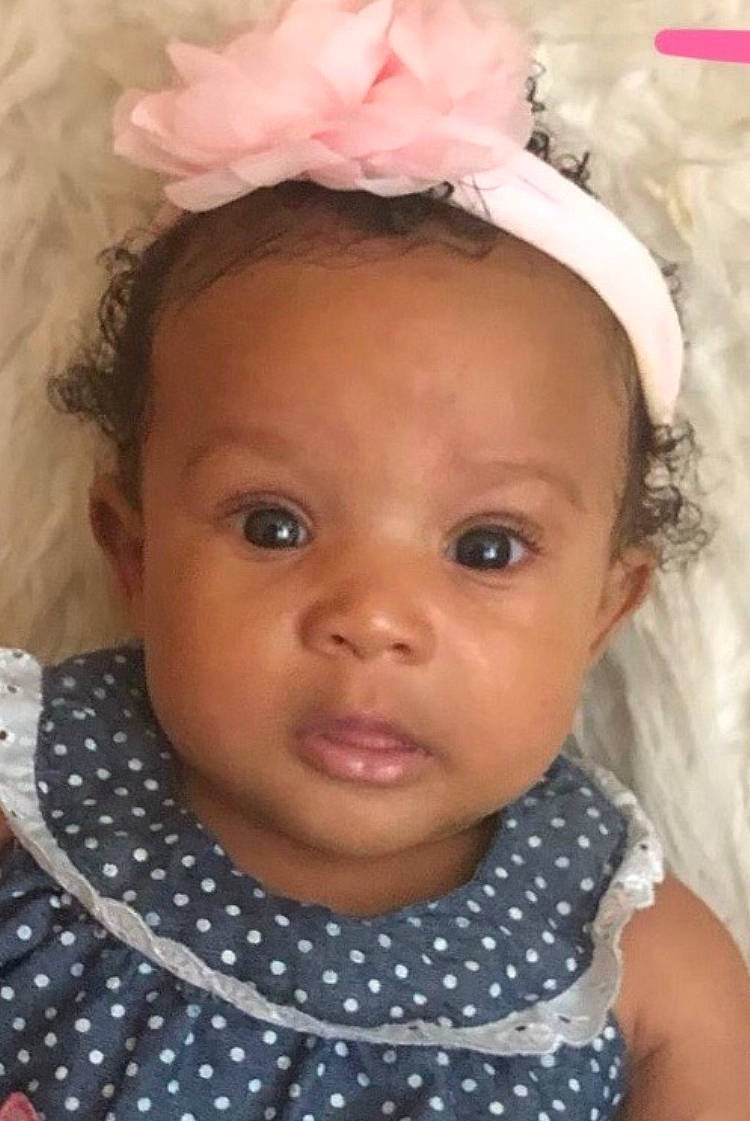 Libby is registered to the contest to win money with this photo: baby, cheek, child, design, eyebrow, face, fashion_accessory, forehead, hair, hair_accessory, hairstyle, head, headgear, lip, nose, pattern, person, pink, polka_dot, skin