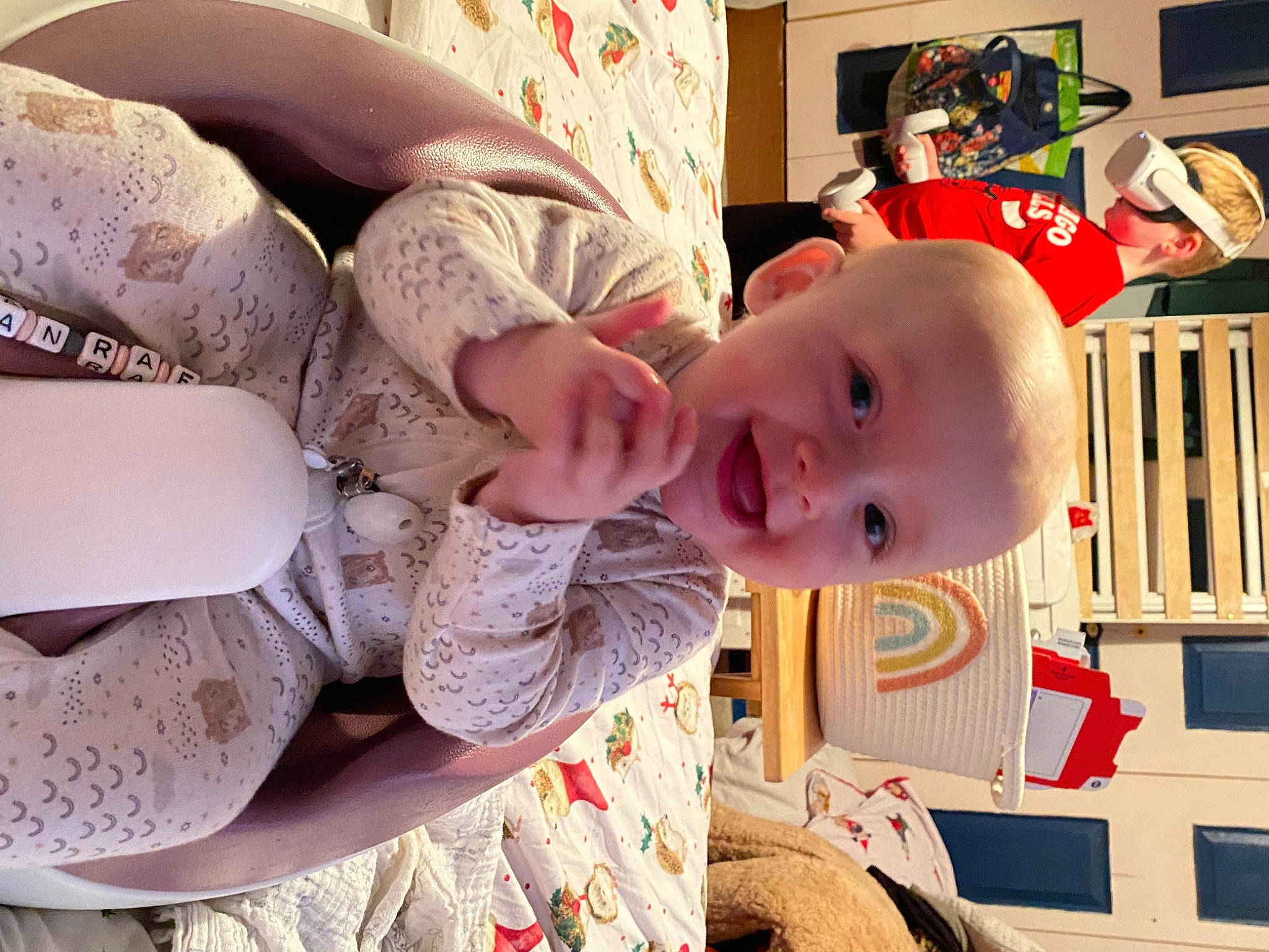 Ocean Rae joined the competition — help win amazing prizes! baby, baby_toddler_clothing, cheek, child, comfort, fun, happy, joy, linens, pattern, person, product, room, skin, smile, textile, toddler, window, wood