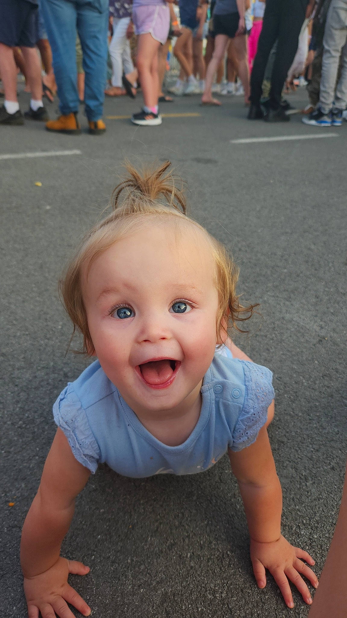 Harleigh joined the competition — help win amazing prizes! asphalt, baby_toddler_clothing, blue, chin, eye, fun, hairstyle, happy, head, human, iris, joint, person, photograph, public_space, skin, sleeve, smile, summer, toddler