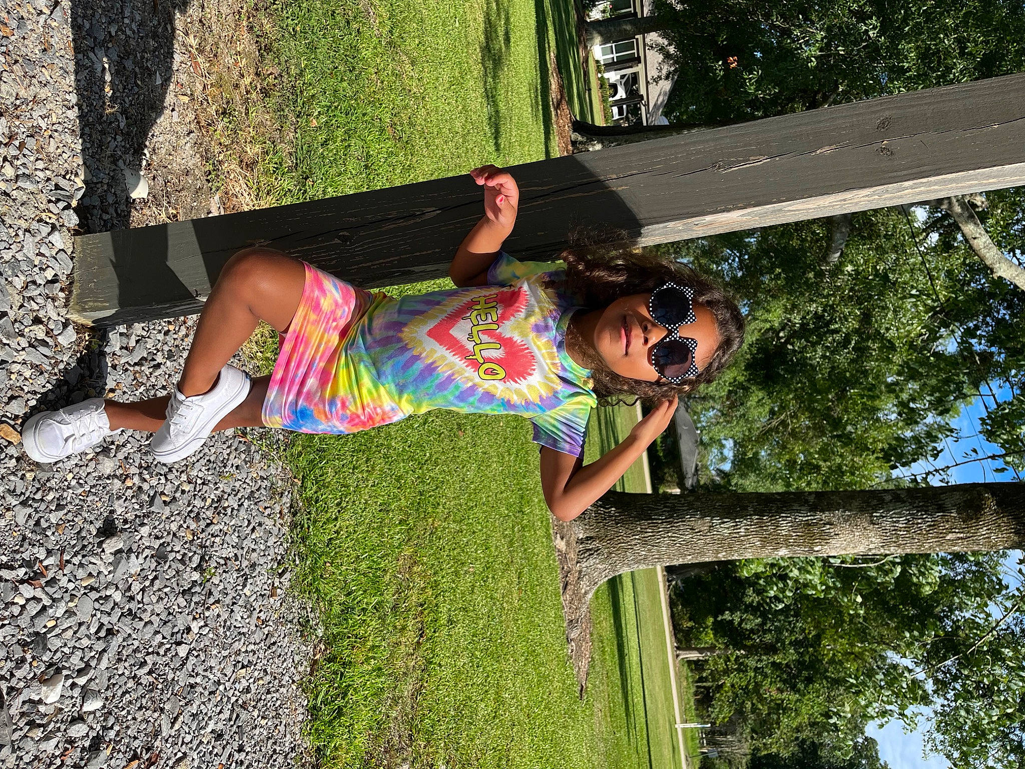 Londyn joined the competition — help win amazing prizes! calf, child, foot, fun, grass, green, happy, human_leg, leisure, magenta, pattern, people_in_nature, person, plant, smile, sunglasses, t_shirt, thigh, toddler, tree