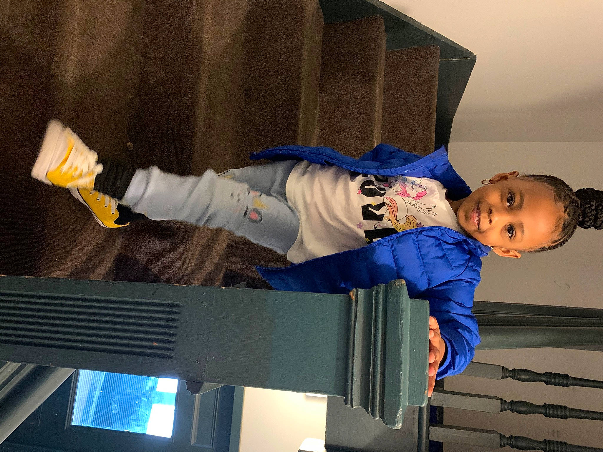 Anaj is registered to the contest to win money with this photo: arm, baby_toddler_clothing, blue, child, comfort, elbow, electric_blue, jacket, joy, knee, person, room, sleeve, smile, sportswear, t_shirt, toddler, walking_shoe
