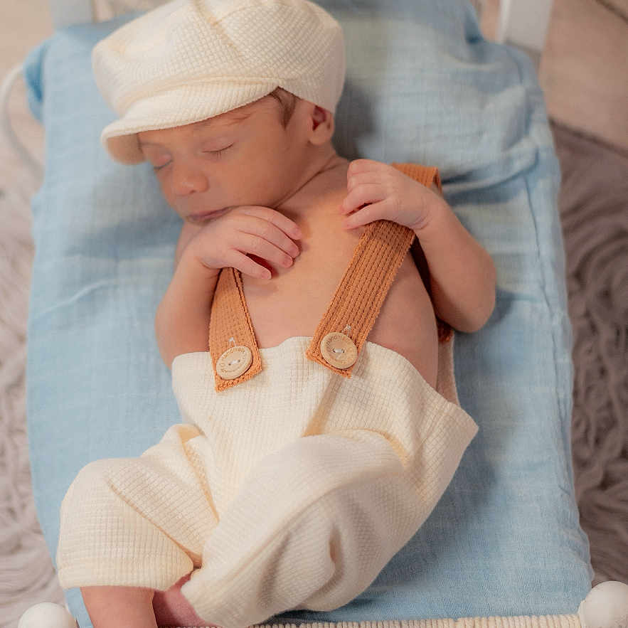 Lucifer joined the competition — help win amazing prizes! baby, bed, blue_blanket, cap, child, cozy, cute, feet, hands, indoors, infant, knitwear, newborn, peaceful, portrait, resting, sleeping, small_bed, soft_texture, woven_bed