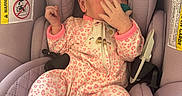 Octavia joined the competition — help win amazing prizes! newborn, baby, car_seat, onesie, pacifier, sleeping, infant, pink, purple, clothing, child, face, hand, seatbelt, safety_strap, cute, portrait, indoors, resting, small