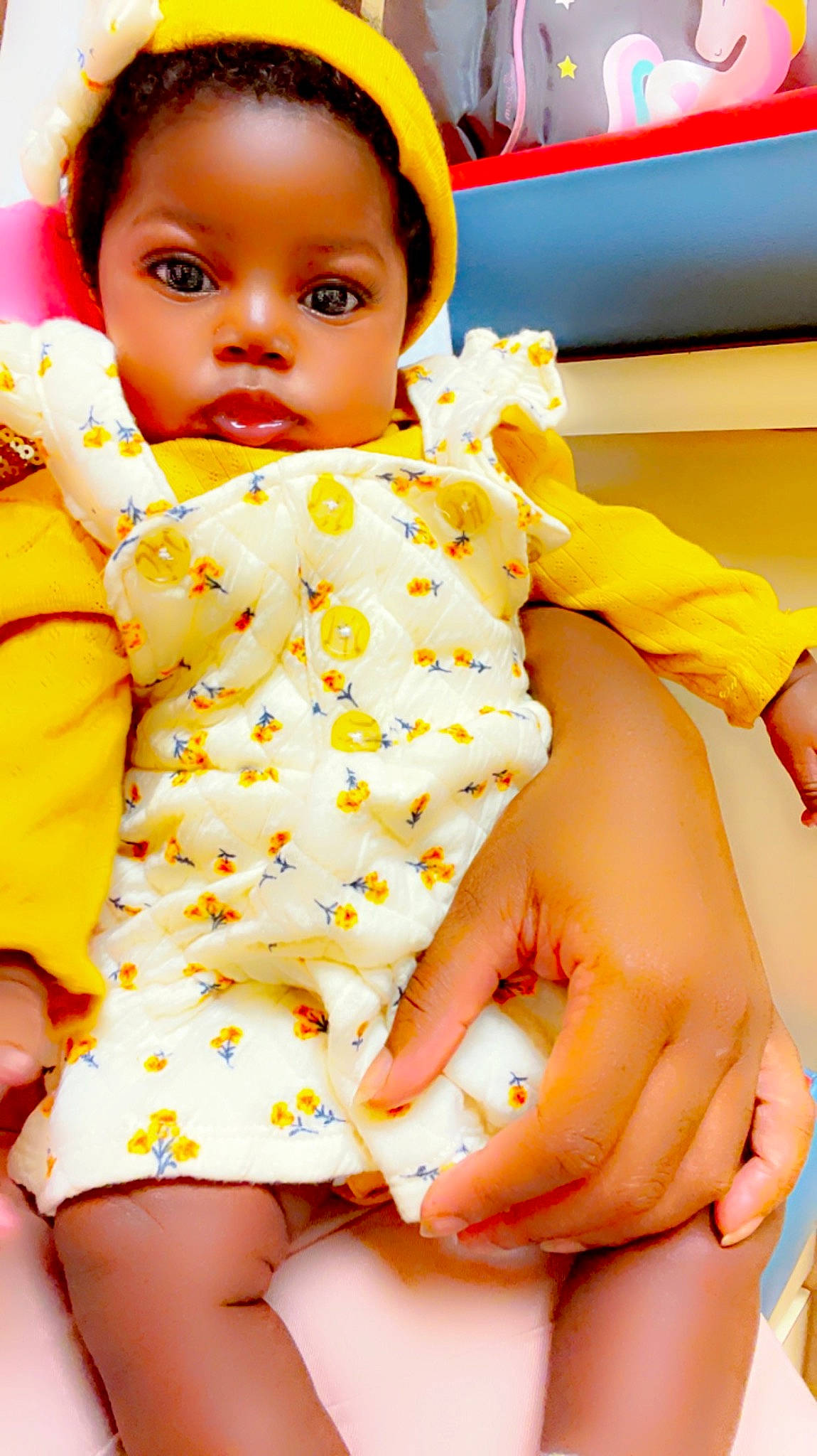 Janyla is registered to the contest to win money with this photo: baby_toddler_clothing, cheek, dress, eye, finger, happy, head, leg, mouth, nose, one_piece_garment, orange, organ, person, photograph, pink, skin, thigh, toddler, white