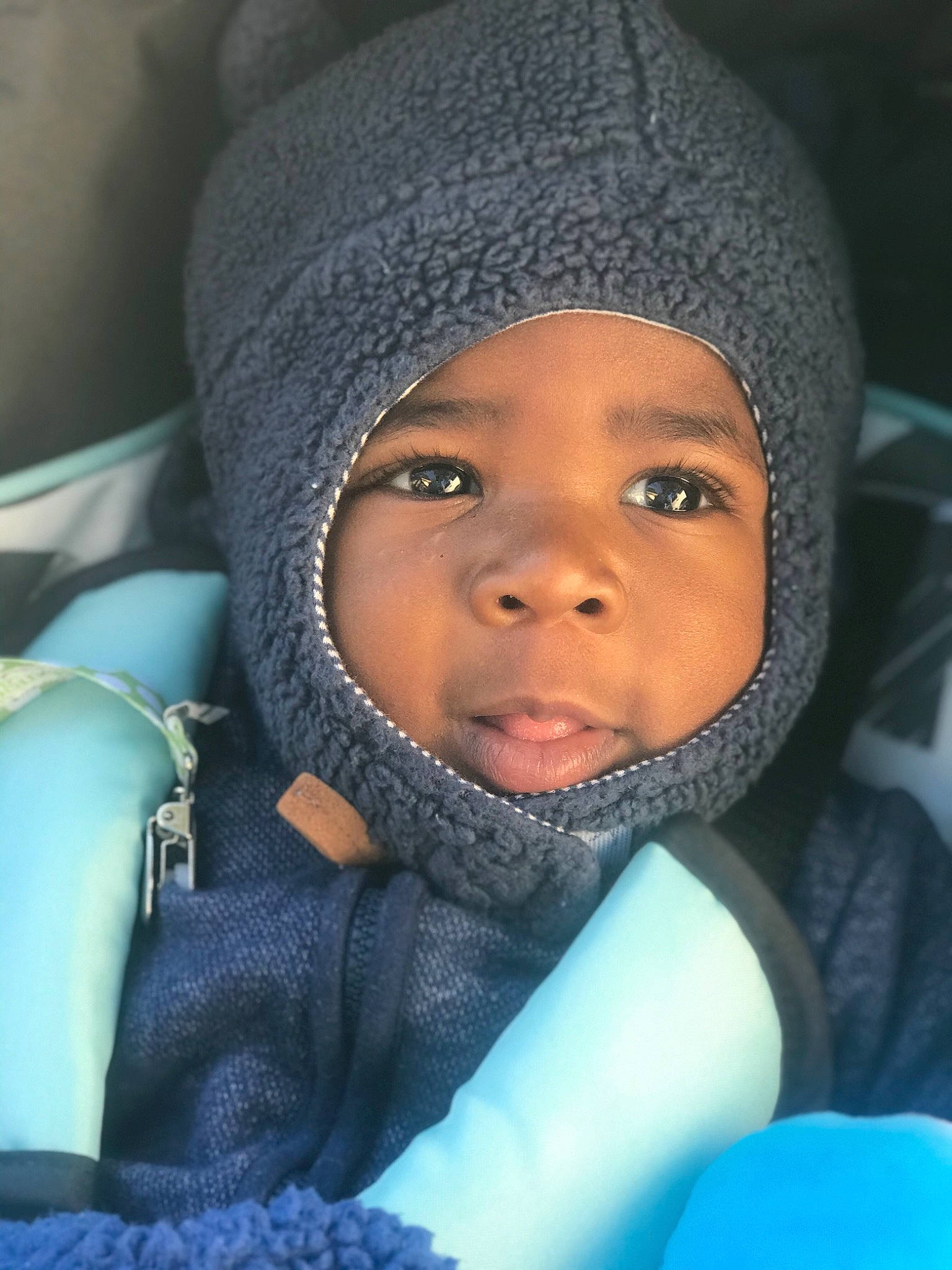 Denzel joined the competition — help win amazing prizes! baby, bonnet, cheek, child, close_up, eye, face, forehead, head, headgear, headwear, human, knit_cap, lip, nose, person, skin, smile, toddler, winter
