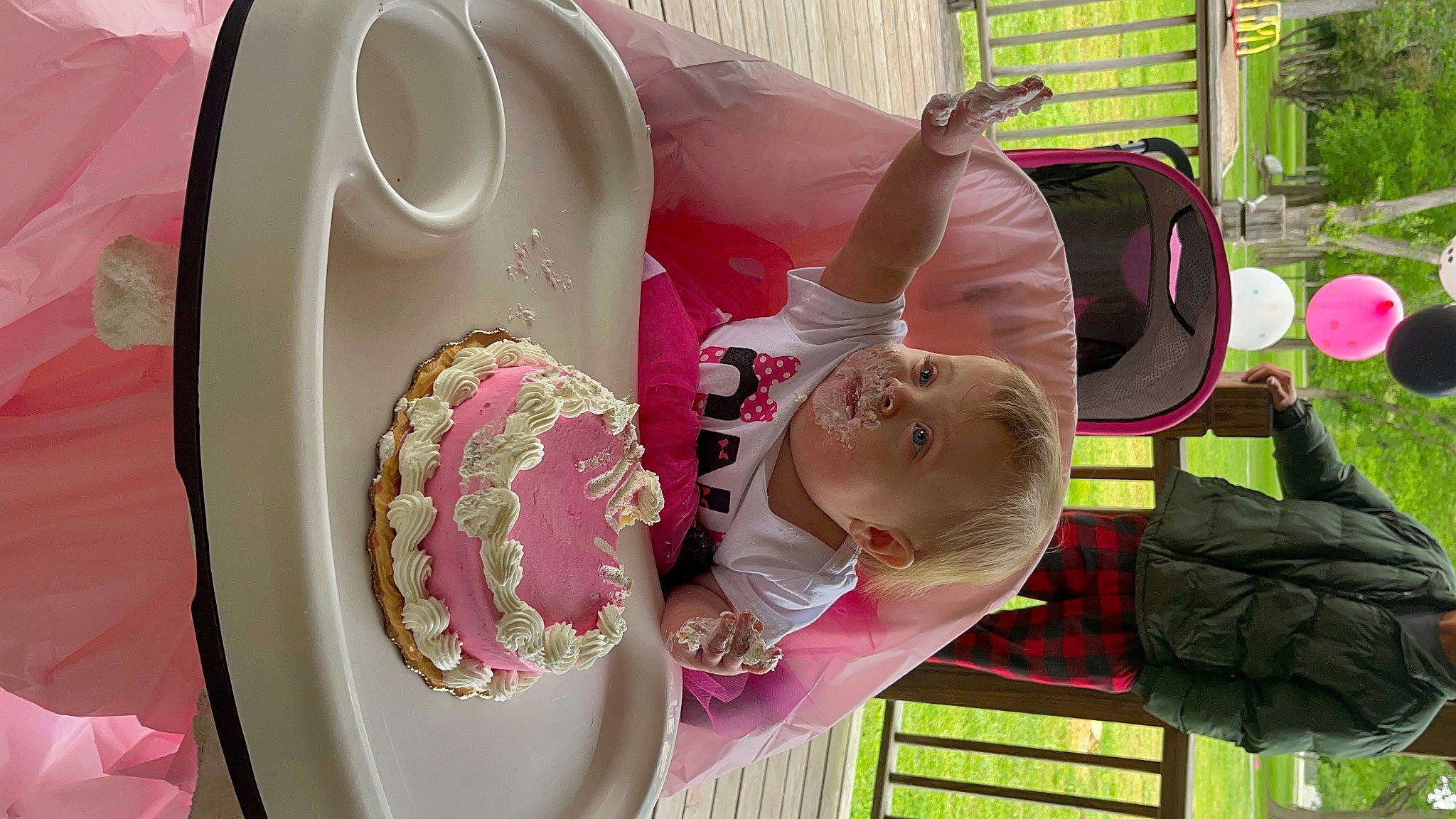 Isabella joined the competition — help win amazing prizes! automotive_wheel_system, baby, baby_products, baby_toddler_clothing, child, fun, grass, green, hat, leisure, magenta, person, pink, play, room, sitting, smile, sun_hat, toddler