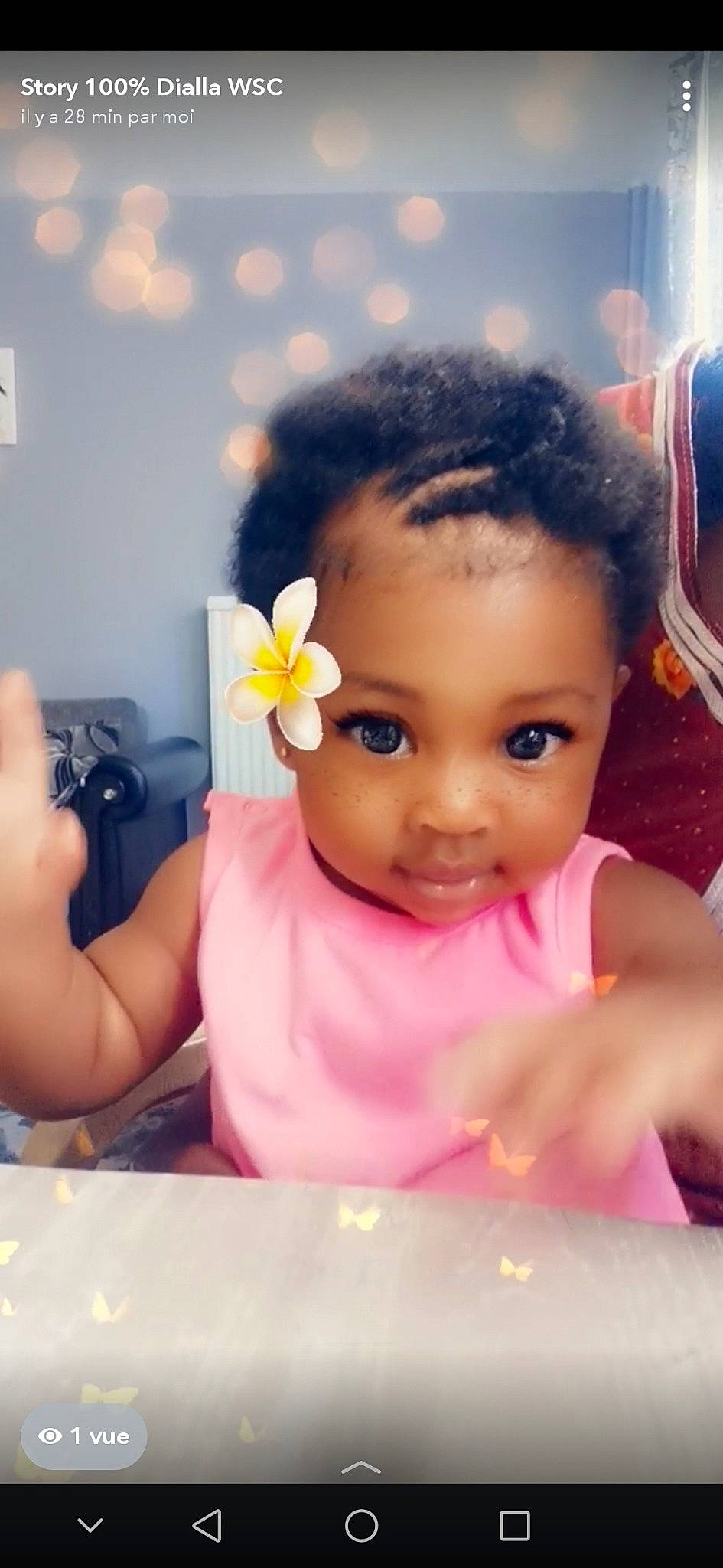 Dialla participe au concours pour gagner de l'argent avec cette photo : baby, beauty, black_hair, cheek, child, ear, face, forehead, fun, hair, hair_accessory, hairstyle, head, nose, person, play, skin, smile, toddler