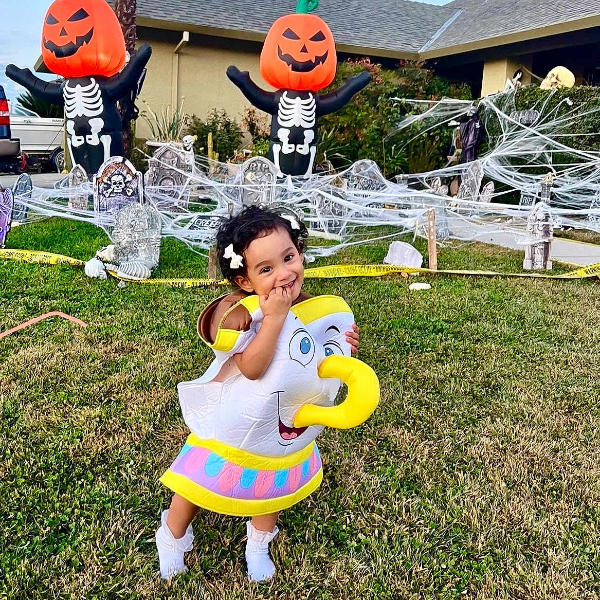Addaline is registered to the contest to win money with this photo: architecture, backyard, building, child, clothing, face, female, girl, grass, head, nature, outdoors, person, photography, plant, portrait, pottedplant, shelter, summer, yard