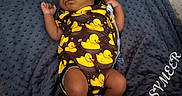 Sy'Meer Lopez joined the competition — help win amazing prizes! baby, sleeping, newborn, infant, portrait, indoors, blanket, blue_blanket, pillow, cloud_pattern, star_pattern, rubber_ducks, duck_print, onesie, pacifier, pacifier_clip, crib, cozy, peaceful, feet
