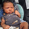 Sy'Meer Lopez joined the competition — help win amazing prizes! baby, newborn, infant, child, portrait, car_seat, vehicle, fuzzy_blanket, blanket, onesie, tractor_print, sitting, indoors, sleepy, serious_expression, face, hand, leg, safety_notice, photography