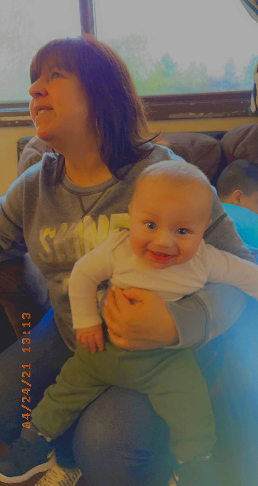 Elijah is registered to the contest to win money with this photo: baby, cheek, eye, face, facial_expression, finger, fun, hairstyle, happy, head, human, interaction, iris, joy, mouth, nose, person, shoulder, skin, smile