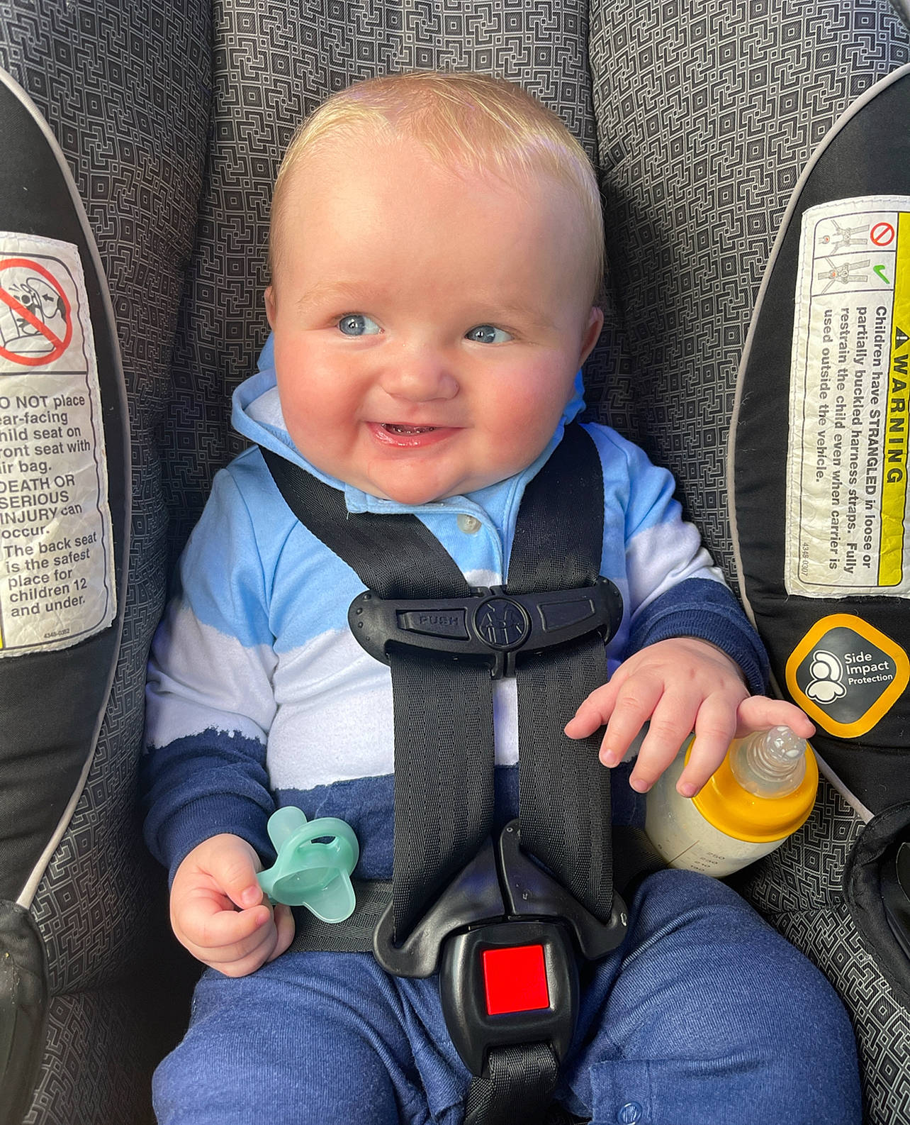 Kade is registered to the contest to win money with this photo: auto_part, baby, baby_carriage, baby_in_car_seat, baby_products, baby_toddler_clothing, car_seat, child, comfort, cool, electric_blue, eye, finger, organ, outerwear, person, product, sitting, skin, smile