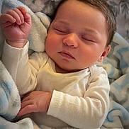 Lorenzo joined the competition — help win amazing prizes! baby, sleeping, blanket, soft, cozy, infant, cute, peaceful, hands, face, clothing, white, blue, bed, rest, newborn, skin, portrait, indoor, comfort
