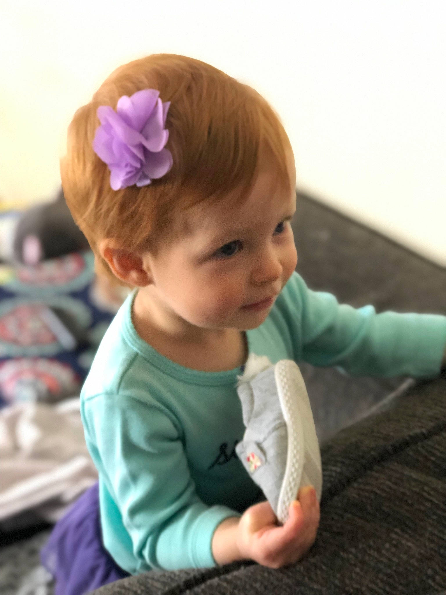 Isadora is registered to the contest to win money with this photo: baby, cap, child, ear, fashion_accessory, hair_accessory, headband, headgear, person, pink, play, toddler