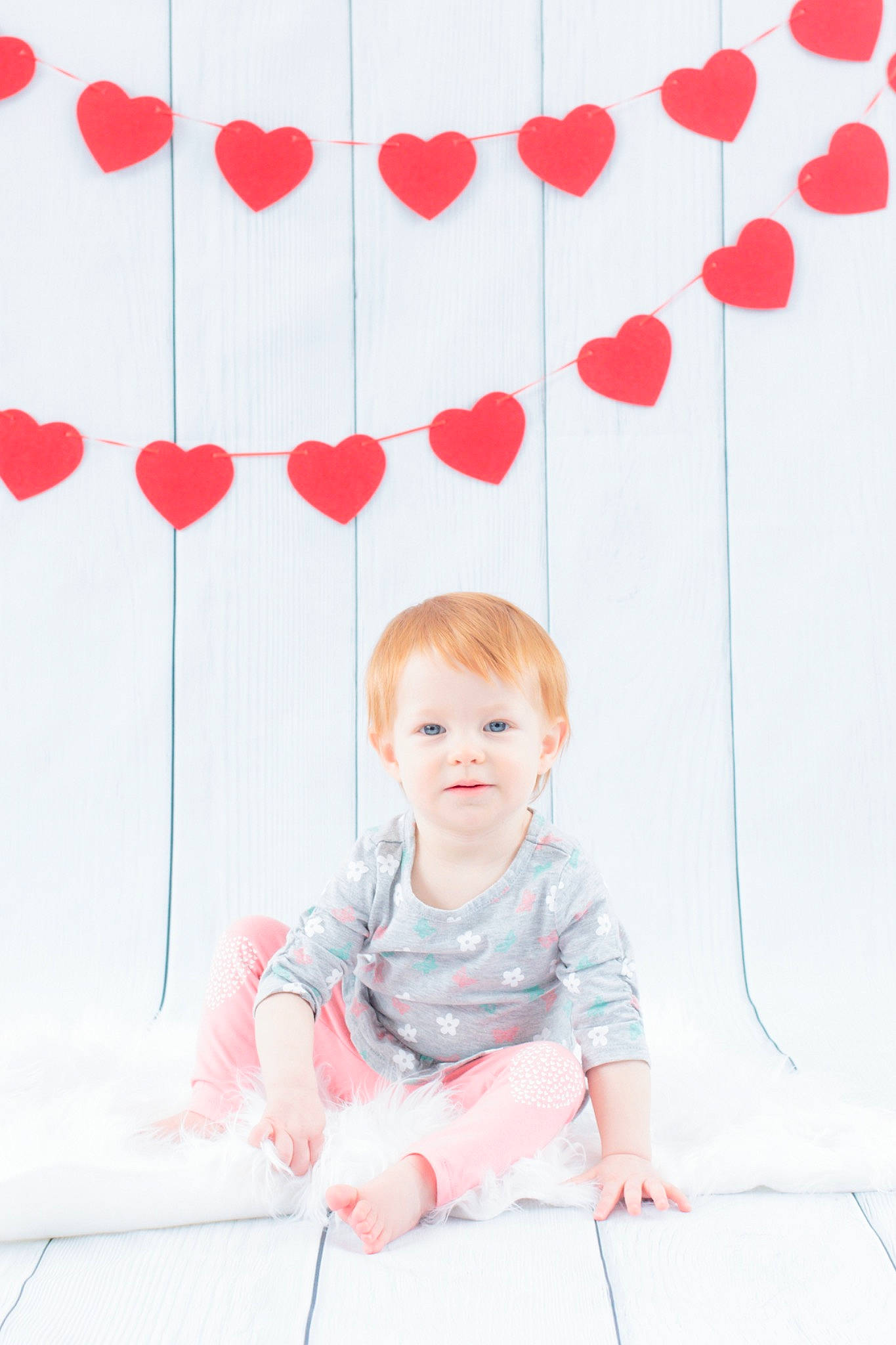 Isadora is registered to the contest to win money with this photo: baby, balloon, child, coquelicot, design, flower, heart, pattern, person, photography, pink, plant, red, smile, toddler