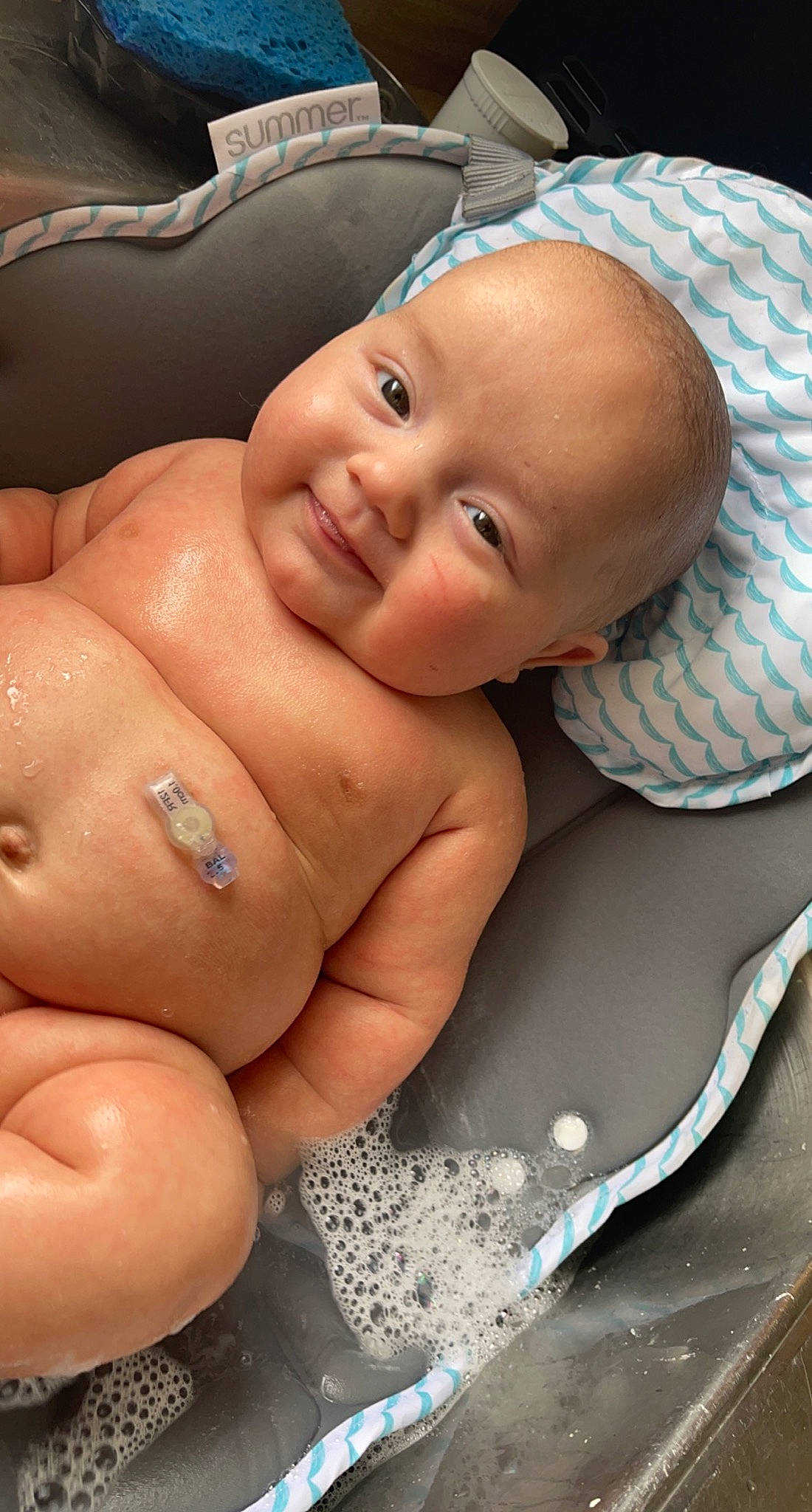 Caysen is registered to the contest to win money with this photo: baby, baby_toddler_clothing, cheek, child, comfort, eyebrow, face, finger, foot, gesture, happy, human_leg, lip, mouth, nail, nose, person, skin, smile, thumb