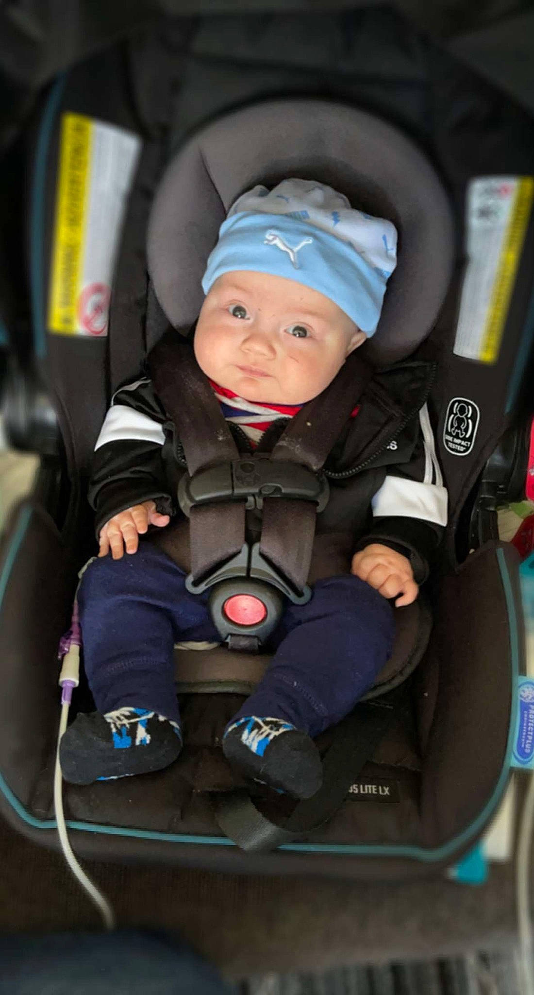Caysen joined the competition — help win amazing prizes! air_travel, airline, auto_part, automotive_design, baby, baby_carriage, baby_in_car_seat, baby_safety, car_seat, car_seat_cover, child, comfort, electric_blue, headwear, helmet, motor_vehicle, person, personal_protective_equipment, seat_belt, smile