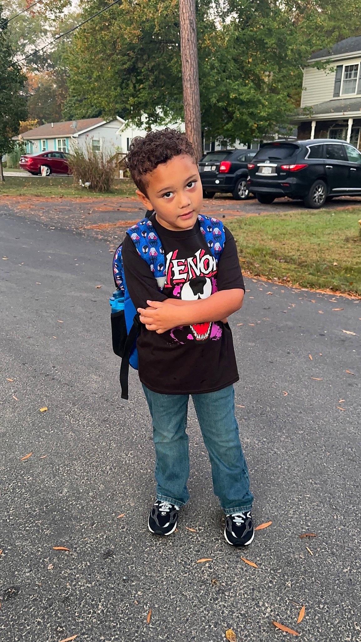 Christian joined the competition — help win amazing prizes! asphalt, car, child, denim, electric_blue, grass, happy, jeans, land_vehicle, leisure, person, plant, recreation, road, t_shirt, tire, travel, tree, vehicle, vehicle_door