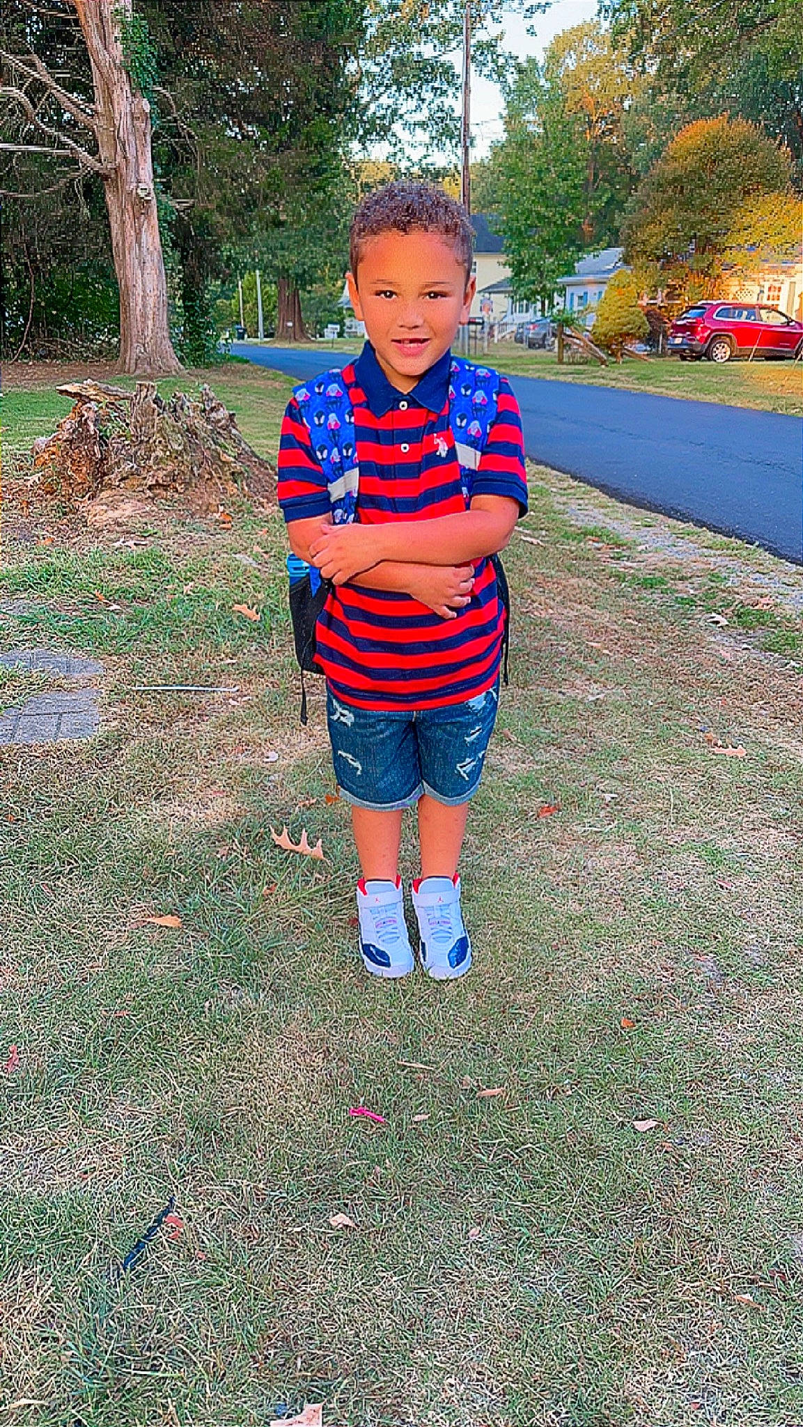 Christian is registered to the contest to win money with this photo: asphalt, child, denim, electric_blue, fun, garden, grass, happy, joy, landscape, leisure, people_in_nature, person, plant, play, recreation, shorts, sleeve, t_shirt, toddler