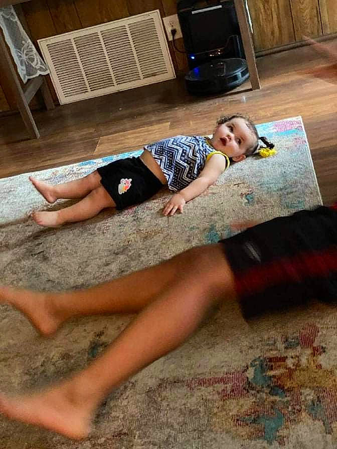 Hazley is registered to the contest to win money with this photo: barefoot, calf, eyewear, finger, floor, flooring, foot, fun, grass, hardwood, human_leg, joint, knee, leg, leisure, person, shoulder, sportswear, thigh, waist