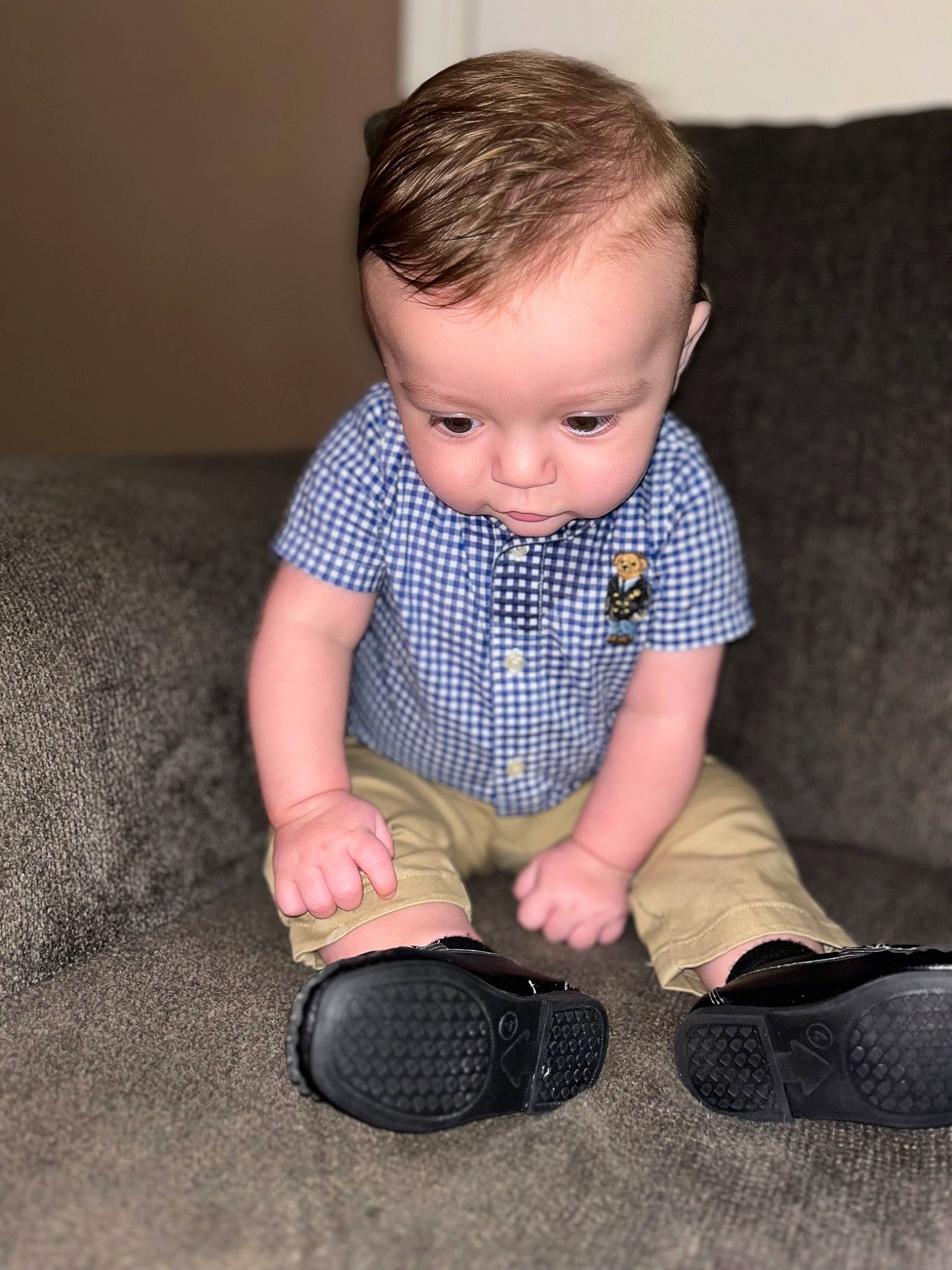 Kamden joined the competition — help win amazing prizes! arm, baby, baby_toddler_clothing, child, comfort, dress, finger, floor, flooring, foot, human_body, human_leg, joint, knee, person, sitting, sleeve, sock, t_shirt, toddler